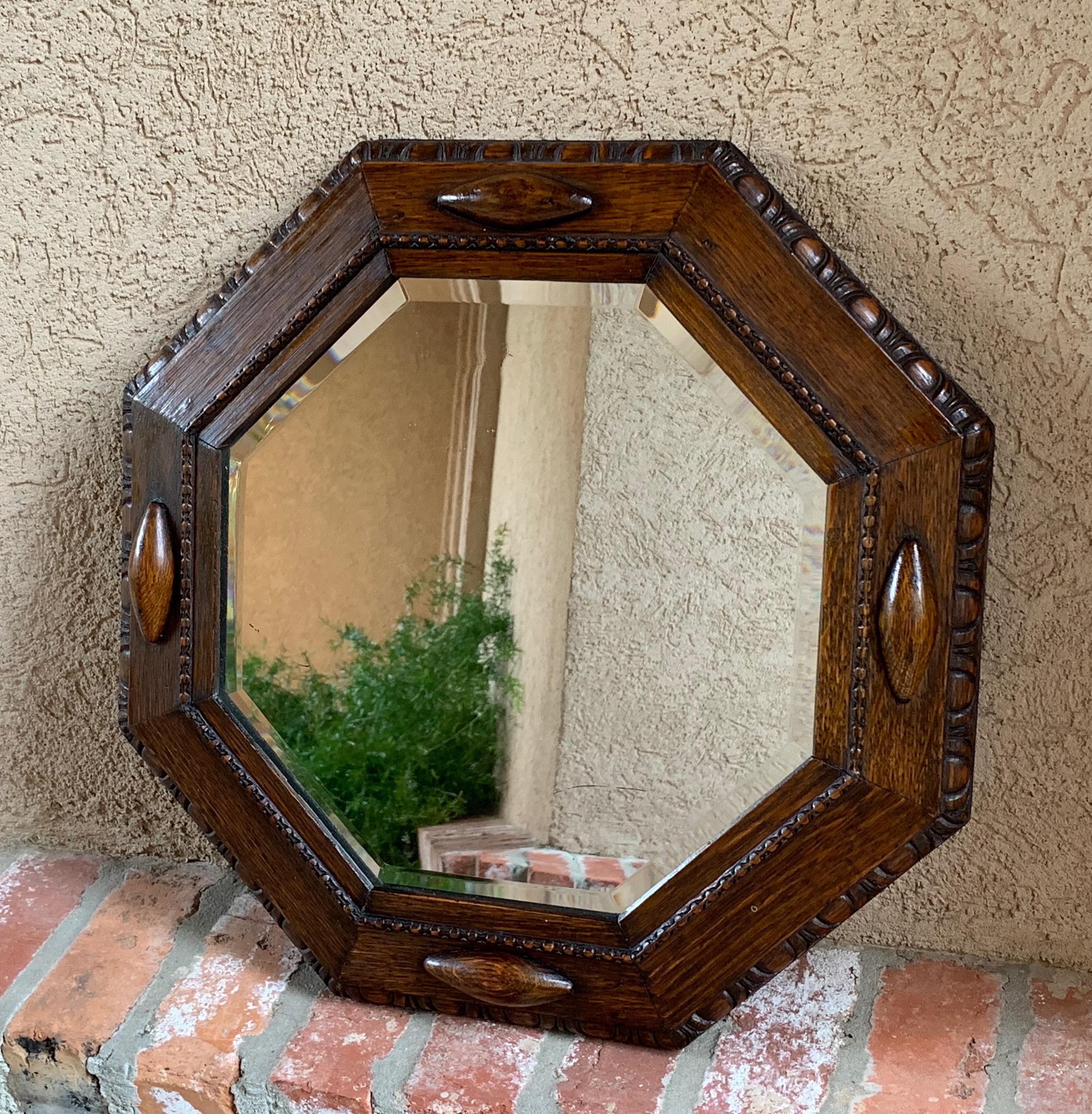English Carved Oak Beveled Wall Mirror Beaded Jacobean Octagon, circa 1920 In Good Condition In Shreveport, LA