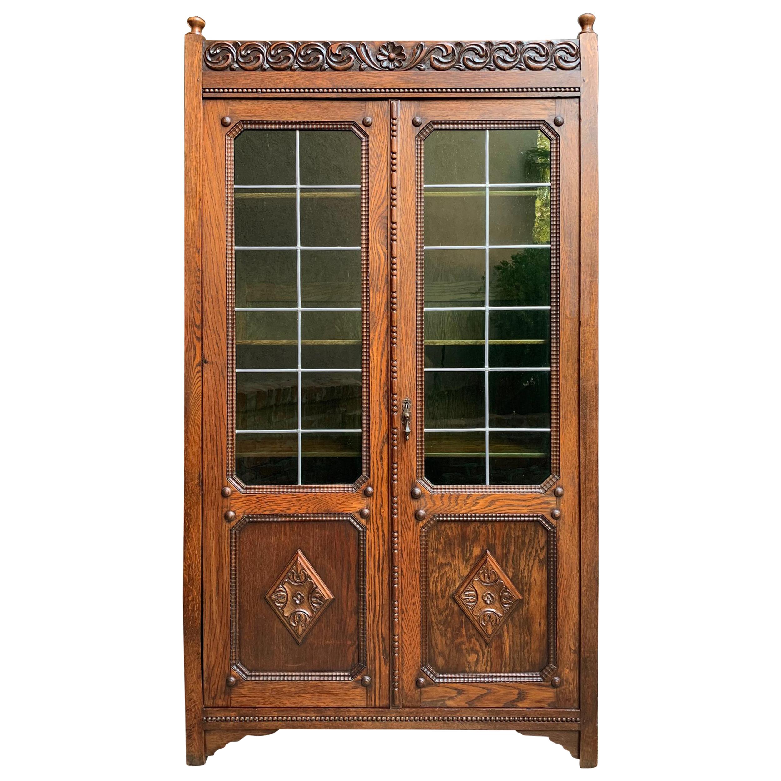 English Carved Oak Bookcase Green Leaded Glass Jacobean Style, 20th Century