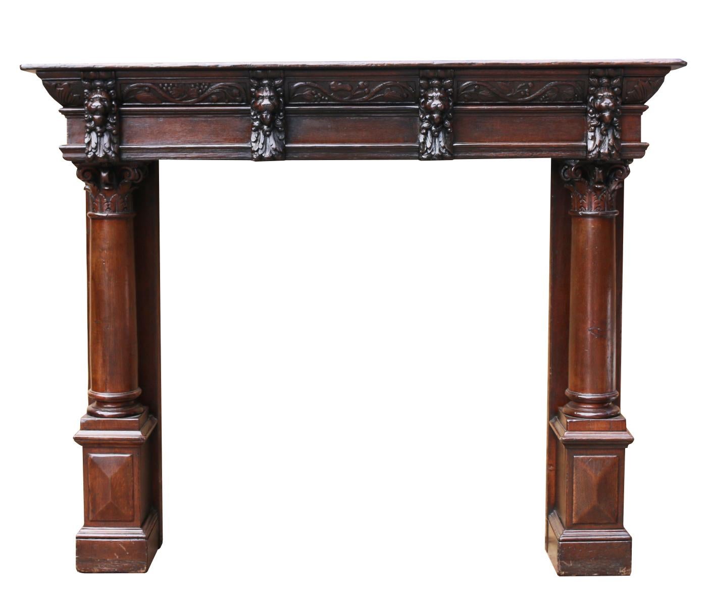 A good quality mid-Victorian, Jacobean style fire surround. Carved cornice with carved lion heads beneath, column supports.

Measure: Opening Height 112 cm

Opening Width 110 cm

Width Between Legs 151 cm.