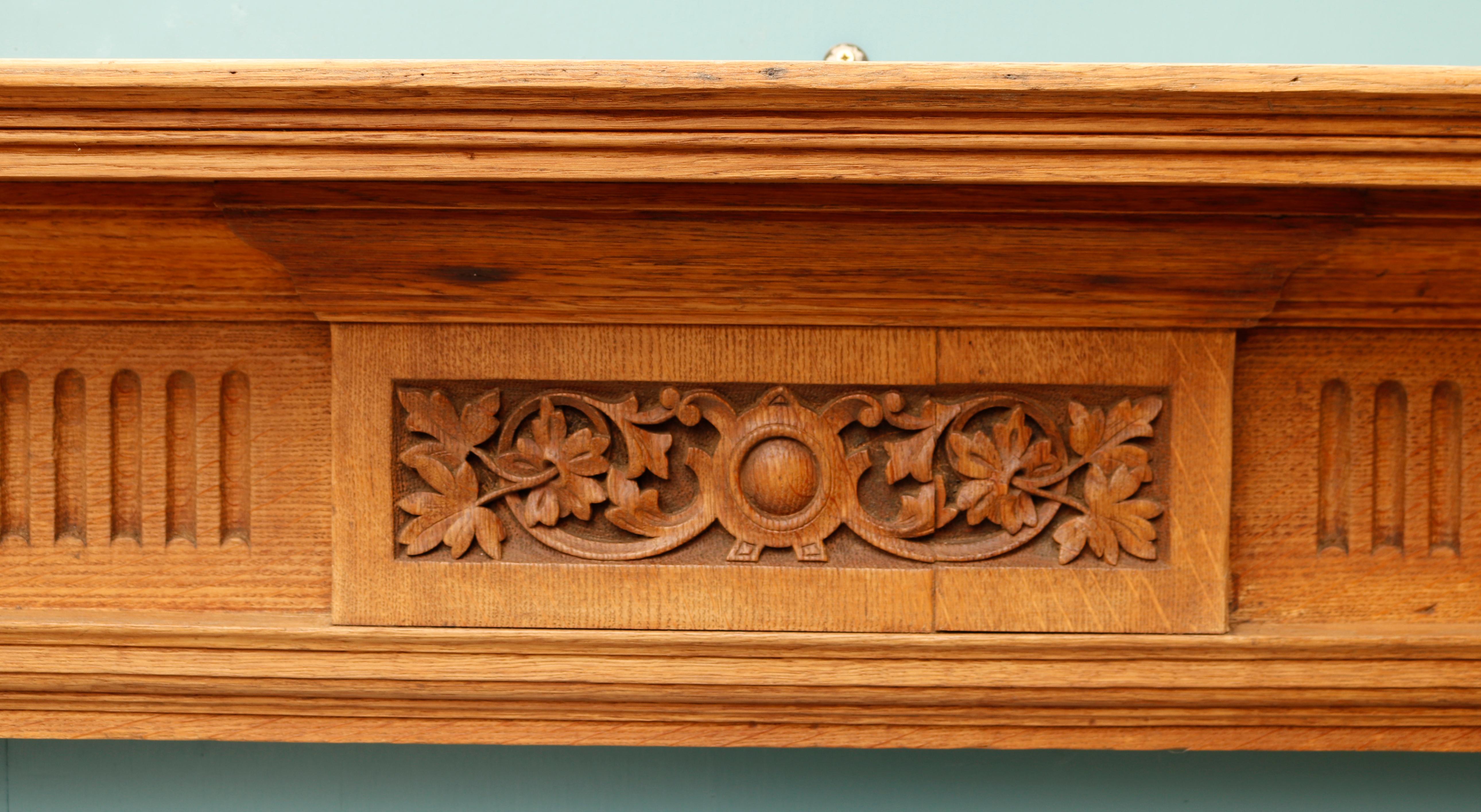 19th Century Antique English Carved Oak Fireplace Surround For Sale