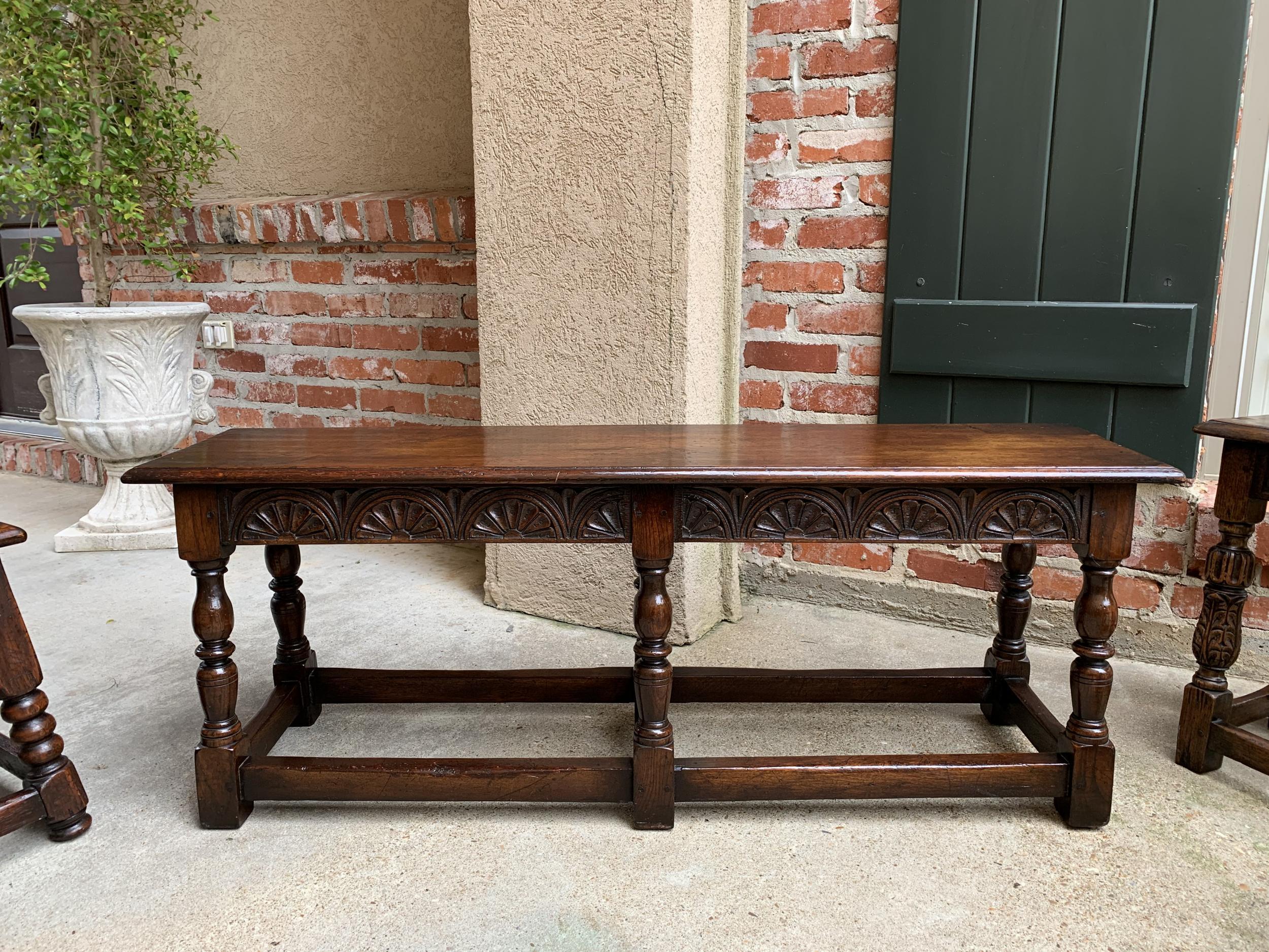 Antique English carved oak hall bench joint stool 4 ft, c 1900

~Direct from England~
~Lovely and versatile antique English bench, in a generous 4 ft. size~
~Wide apron is carved on all sides with traditional lunette design~
~Six elaborately