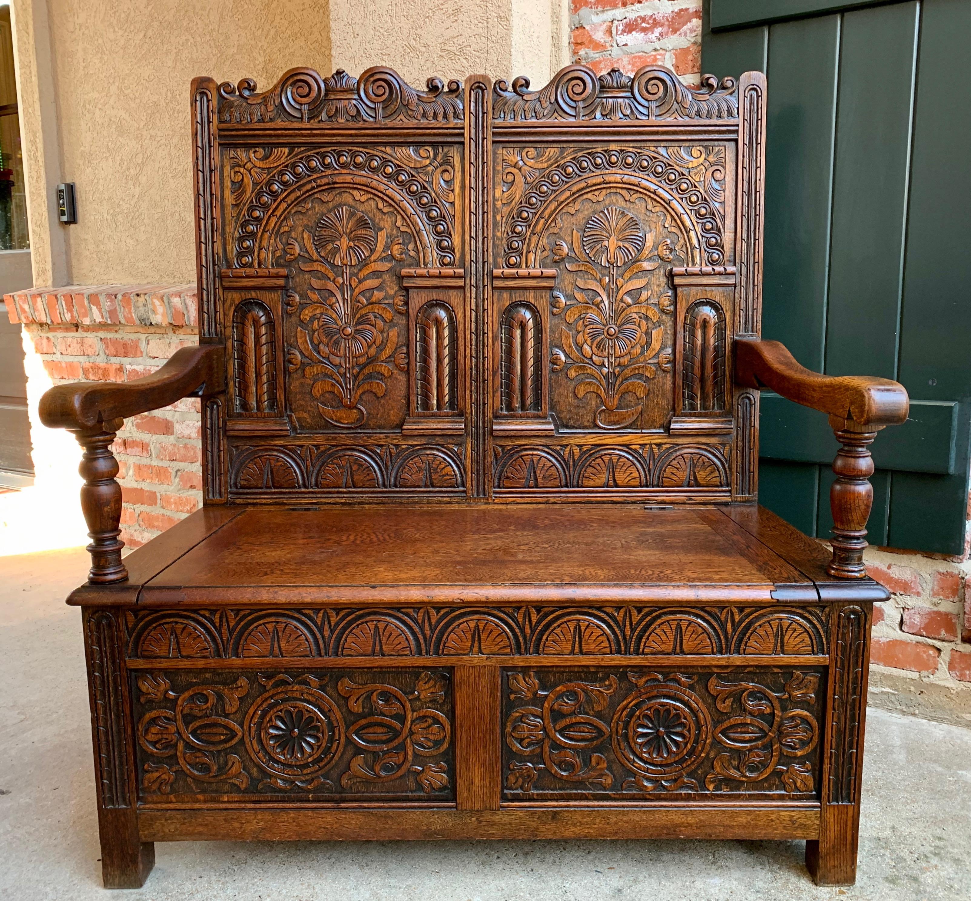 Direct from England, a lovely carving completely covers this versatile antique English hall bench!
~3.5 ft. length, high back with scalloped carved upper and fully carved dual panels in a traditional English motif~
~Lower front bench panels also