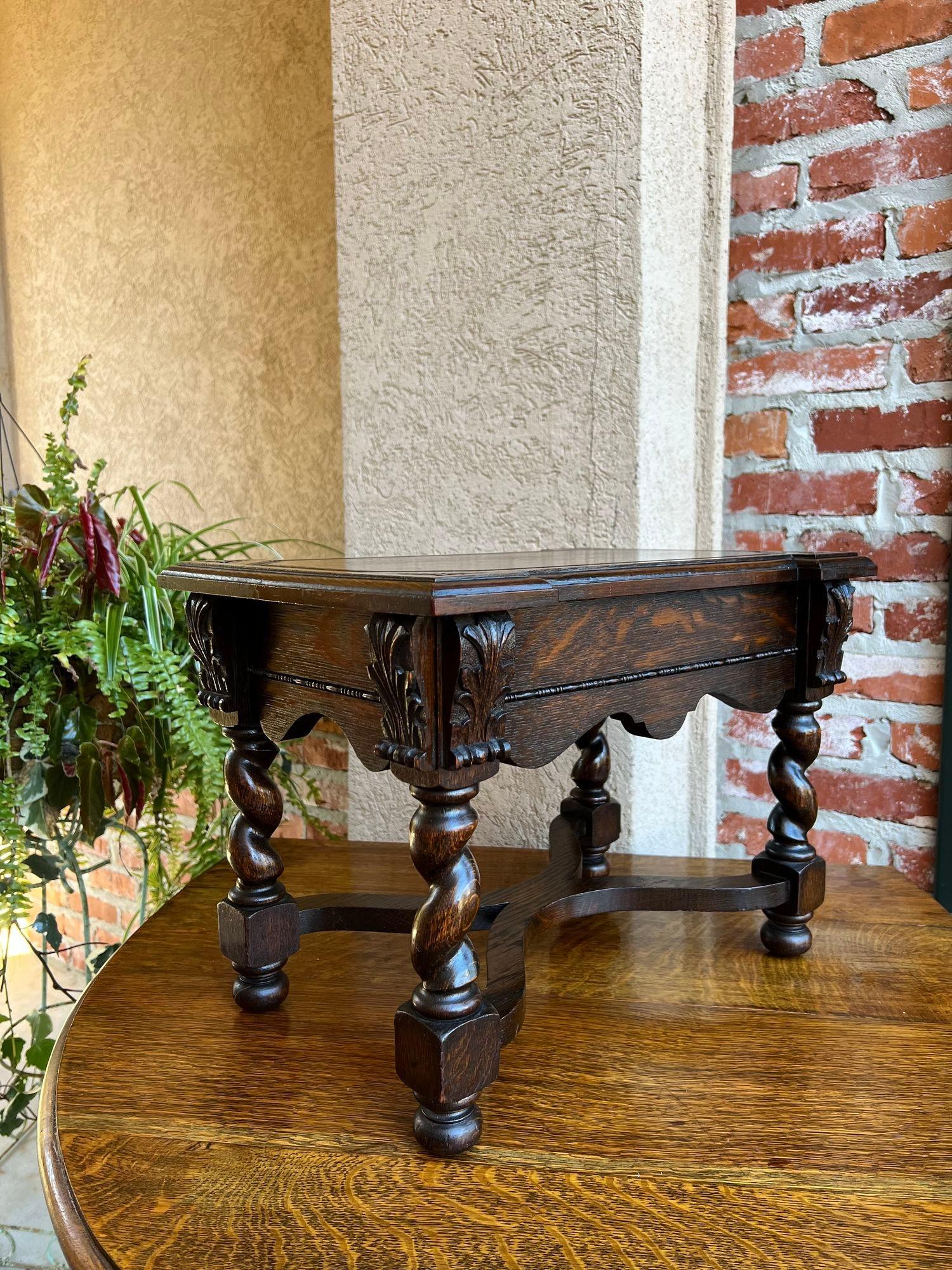 Antique English carved oak stool bench barley twist display table stand.

 Direct from England, another classic English stool, yet this one featuring carvings and shaped stretchers and barley twist legs!
One of our most requested antiques, these