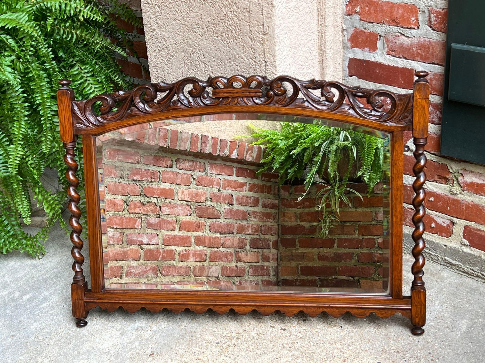 British Antique English Carved Oak Wall Mirror Barley Twist Arched Top Frame Jacobean For Sale