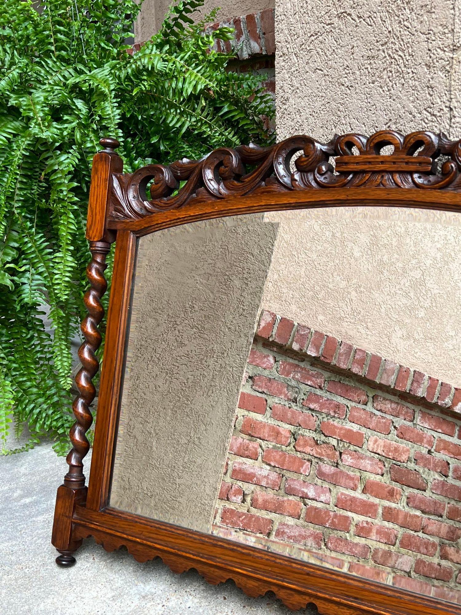 Early 20th Century Antique English Carved Oak Wall Mirror Barley Twist Arched Top Frame Jacobean For Sale