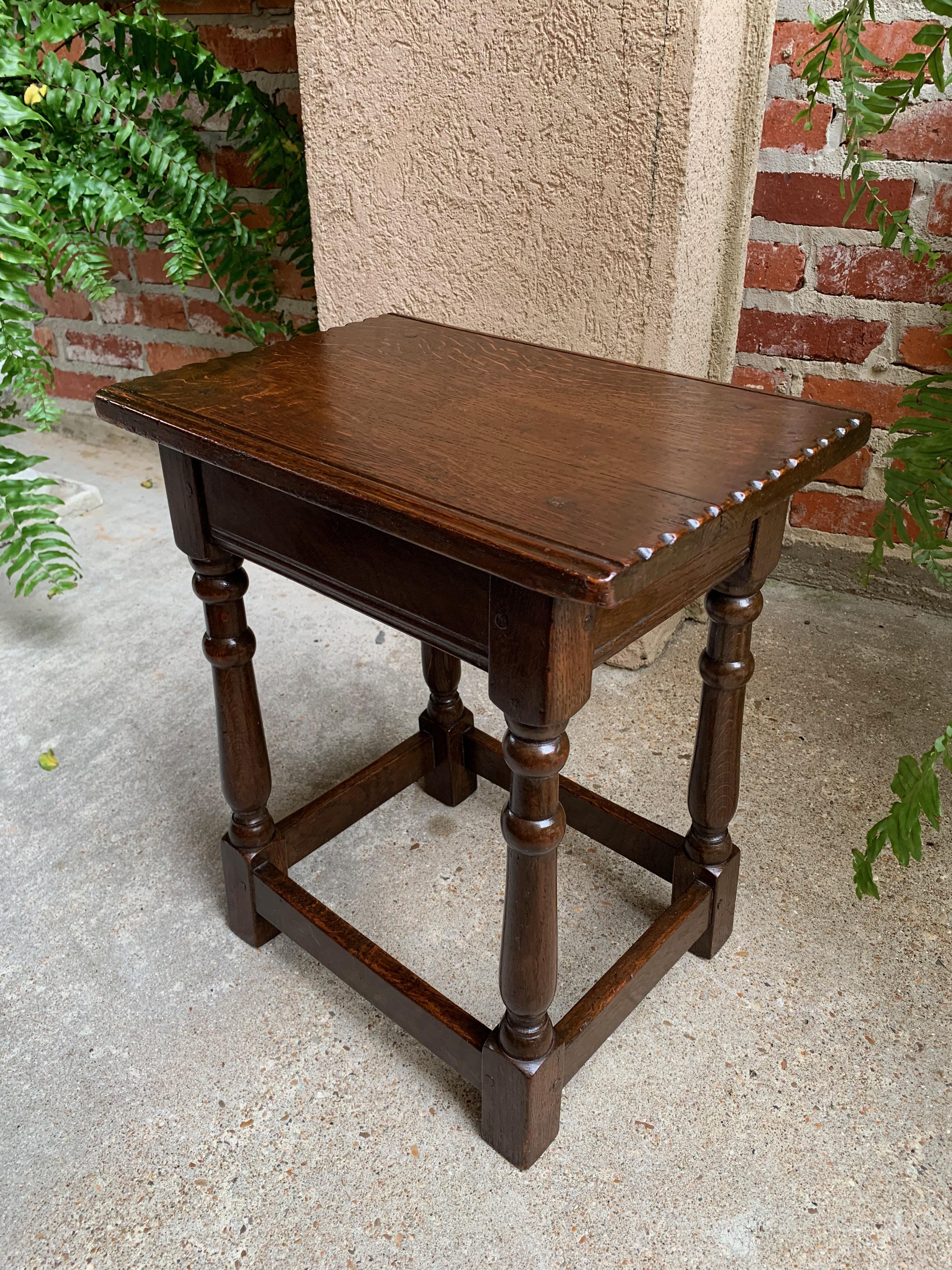 Antique English carved tiger oak Joint stool bench table splayed leg c1900.

~Direct from England, one of the most asked for antiques in our inventory!~
~Lovely antique English oak bench or stool (or petite side table).~
~Reeded and carved edge top
