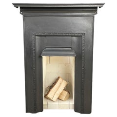 Antique English Cast Iron Fireplace Including Refractory Brick Insert