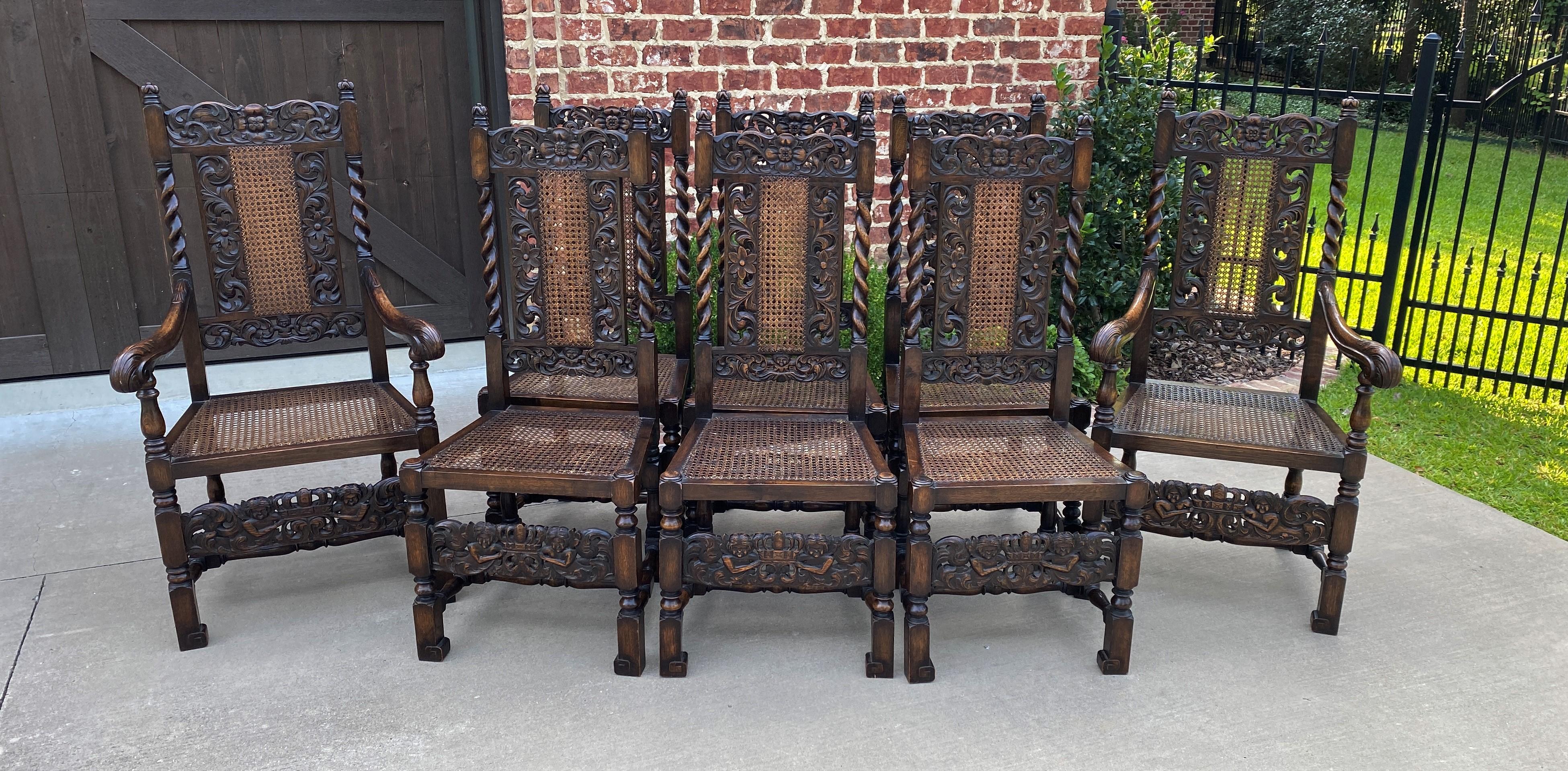 Hard-to-find set of 8 carved oak barley twist chairs with beautifully carved back splats and aprons~~caned backs and seats are in excellent condition~~highly sought after style in today's English Tudor home or French Country cottage

Two arm