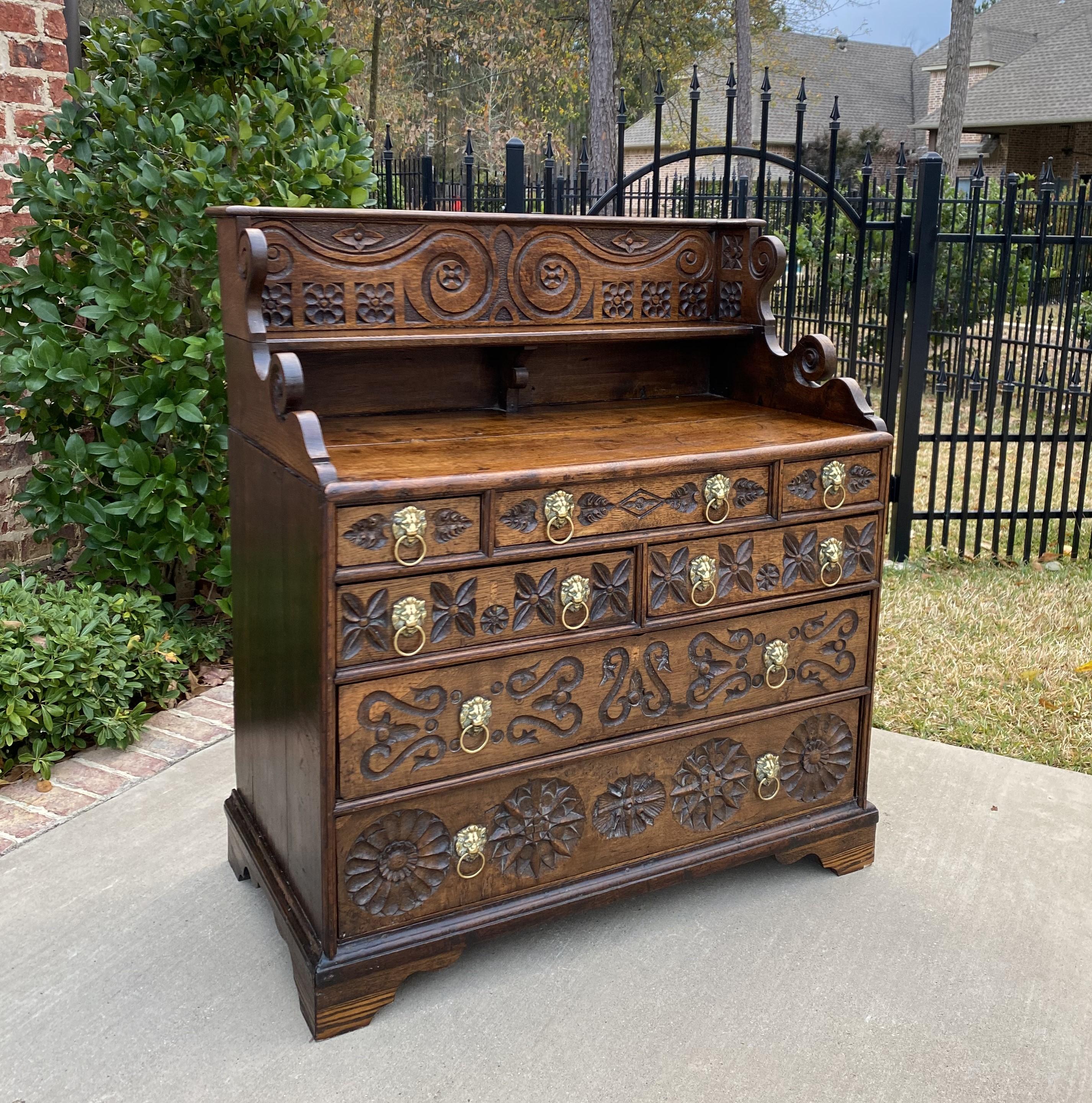 Exquisite antique english oak 18th century Georgian era chest of drawers~~brass lion pulls with upper shelf and gallery~~pre-1800

A must have~~gorgeous example of an 18th century English chest with unique upper shelf and gallery~~ 7 drawers with