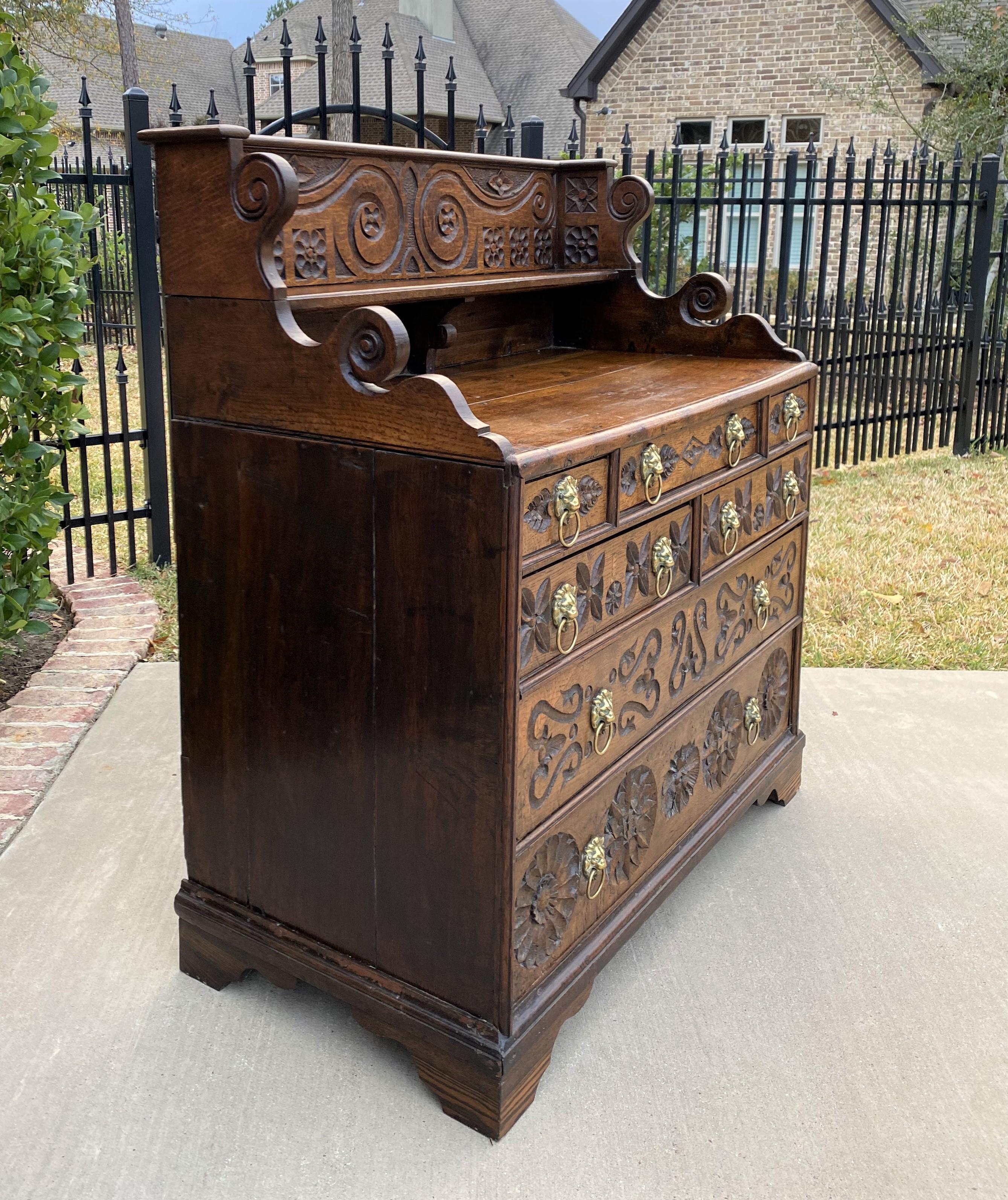 18th Century Antique English Chest of 7 Drawers Georgian Brass Lion Pulls Carved Oak 18th C For Sale