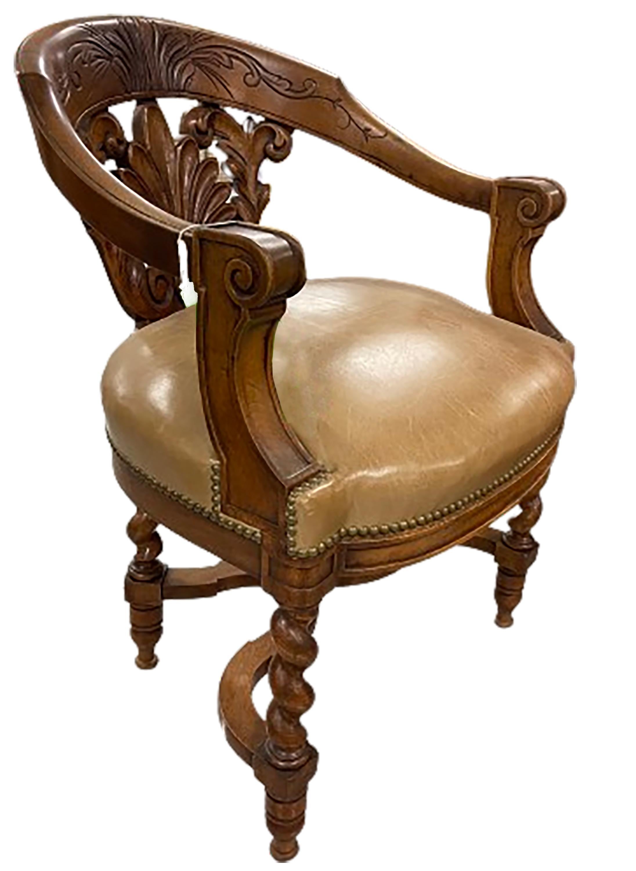 A handsome antique English club chair with hand carved wood features and a light brown leather cushion. The lower pack section has a custom carved floral design. The front legs are a carved barley twist.

No obvious markings on the bottom of the