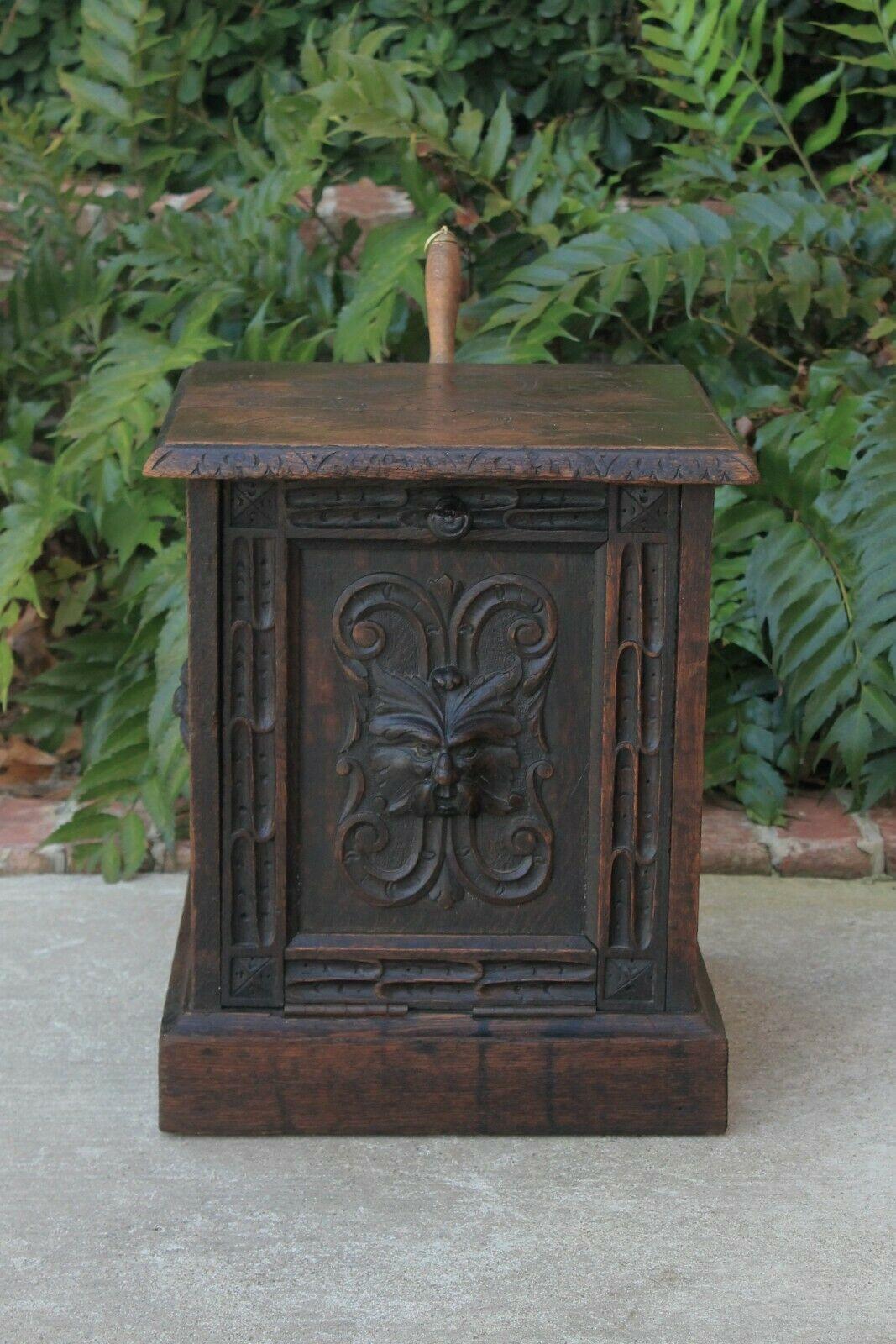 Antique English Oak Renaissance revival carved oak fall front coal hod scuttle with brass scoop~~c. 1880s-1890s

Ornate relief carved beveled edge top with torch carvings~~