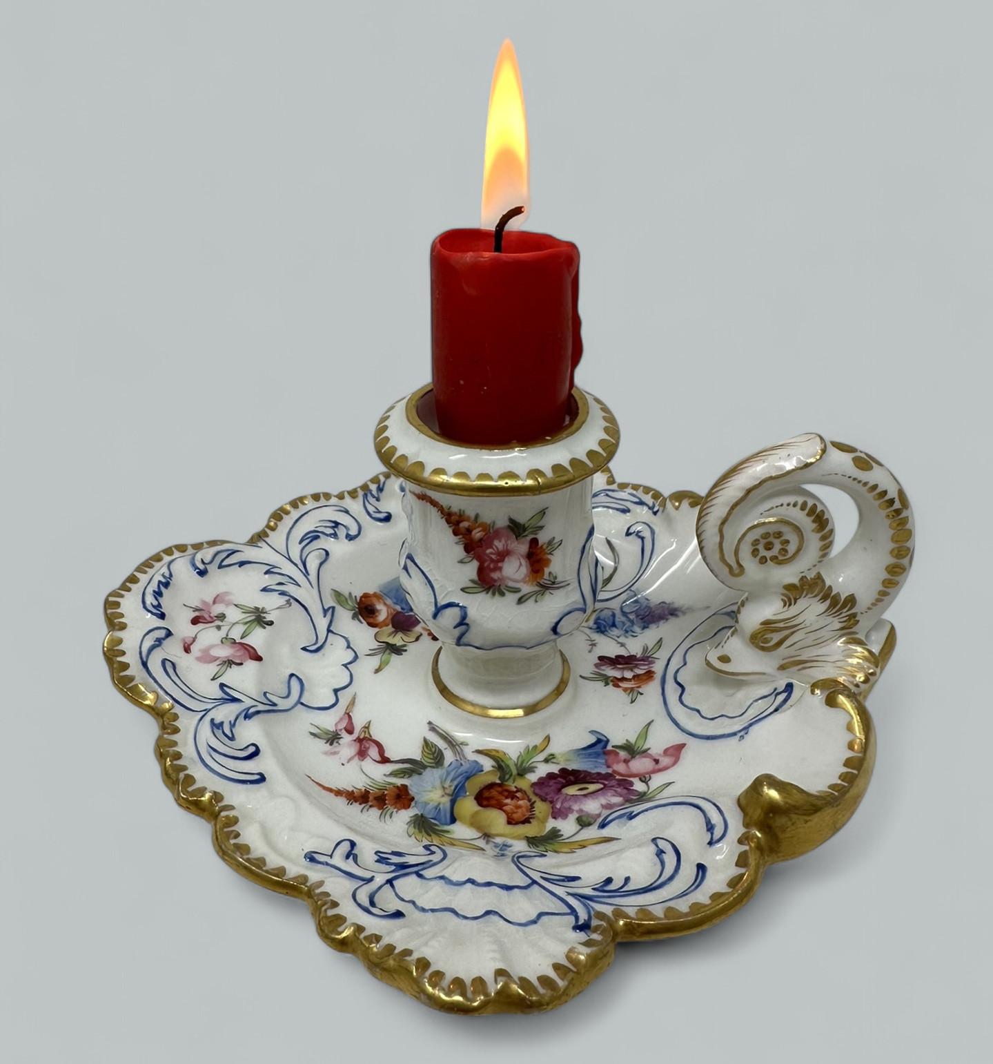 An exceptionally fine quality highly detailed and quite rare single John Rose Coalport “Felt Spar” Porcelain Chamberstick. First quarter of the Nineteenth Century.  

Hand decoration of scattered flowers sprigs amongst moulded scroll forms