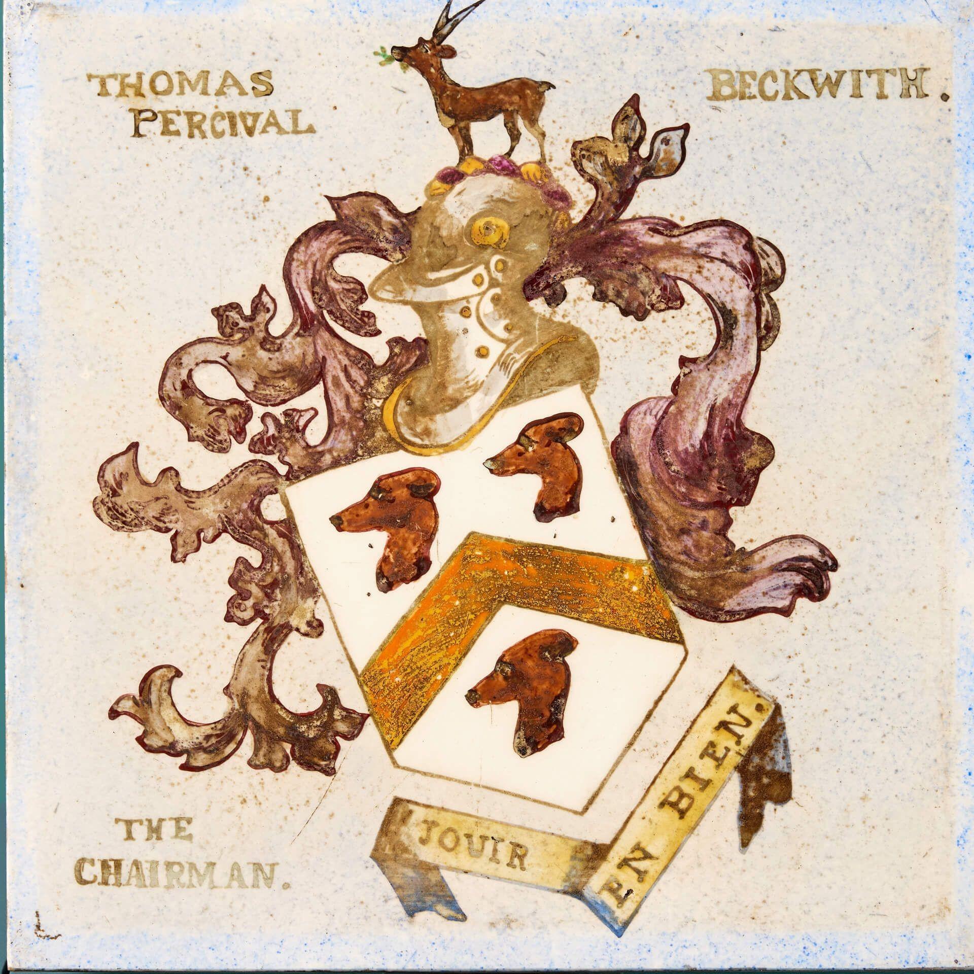 A hand decorated antique English heraldic tile by J. D. Rochfort dating from 1881. This porcelain tile is one of 14 similar we are selling, removed from the now demolished library of the Victorian Brompton Consumption Hospital, London. It depicts