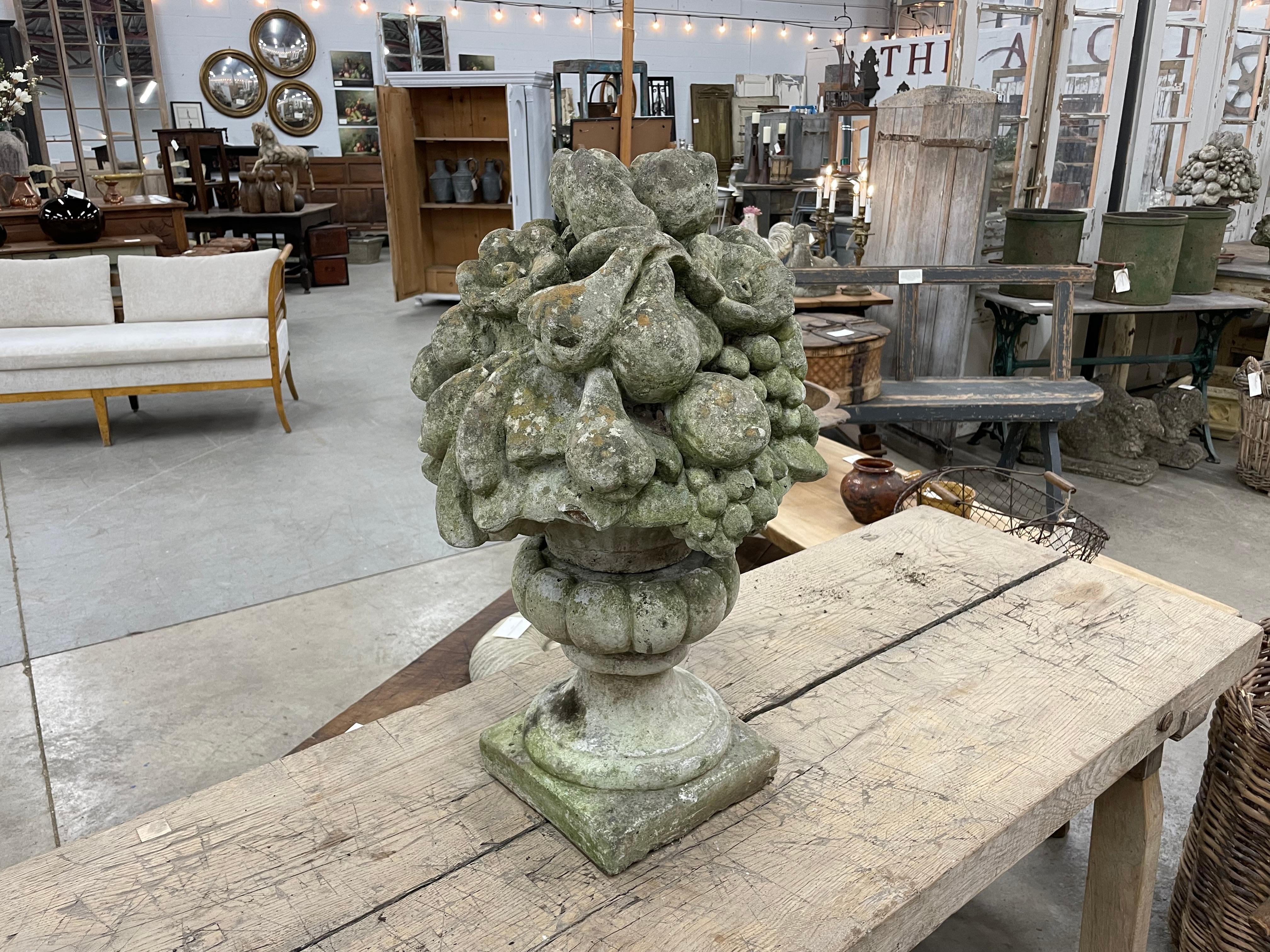 Antique cast stone fruit urns have a rich history and cultural significance. Historically, these urns decorated gardens, estates, and interior spaces. They originated in ancient civilizations, such as Greece and Rome, where they were often crafted