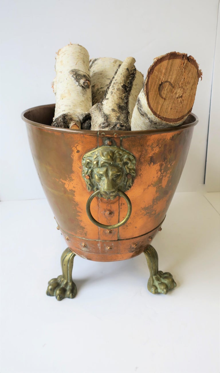 Antique English Copper and Bronze Firewood Log Holder with Lion Heads