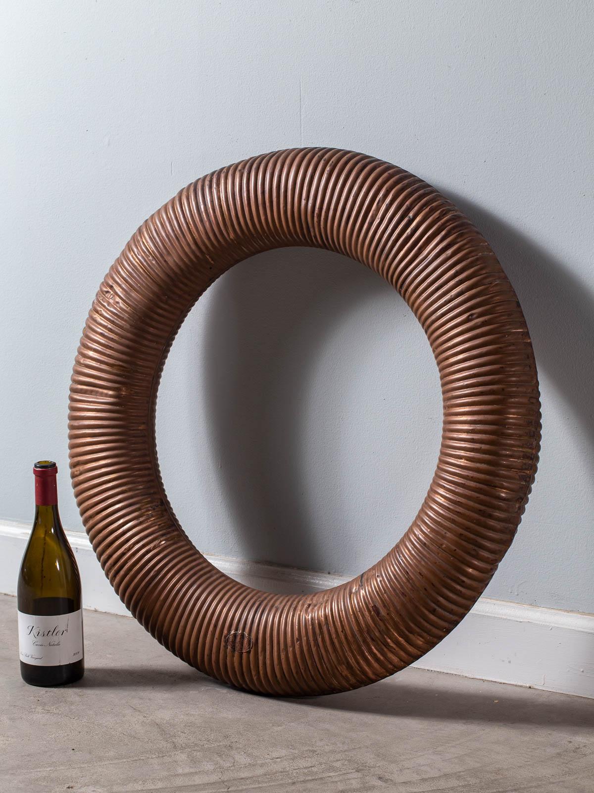 A life-size copper lifebuoy by Sankey Bilston from Wolverhampton England circa 1895. Please enlarge the photographs to see the details in closeup. The original label remains on this life saving artifact from seafaring days. Made of pressed copper