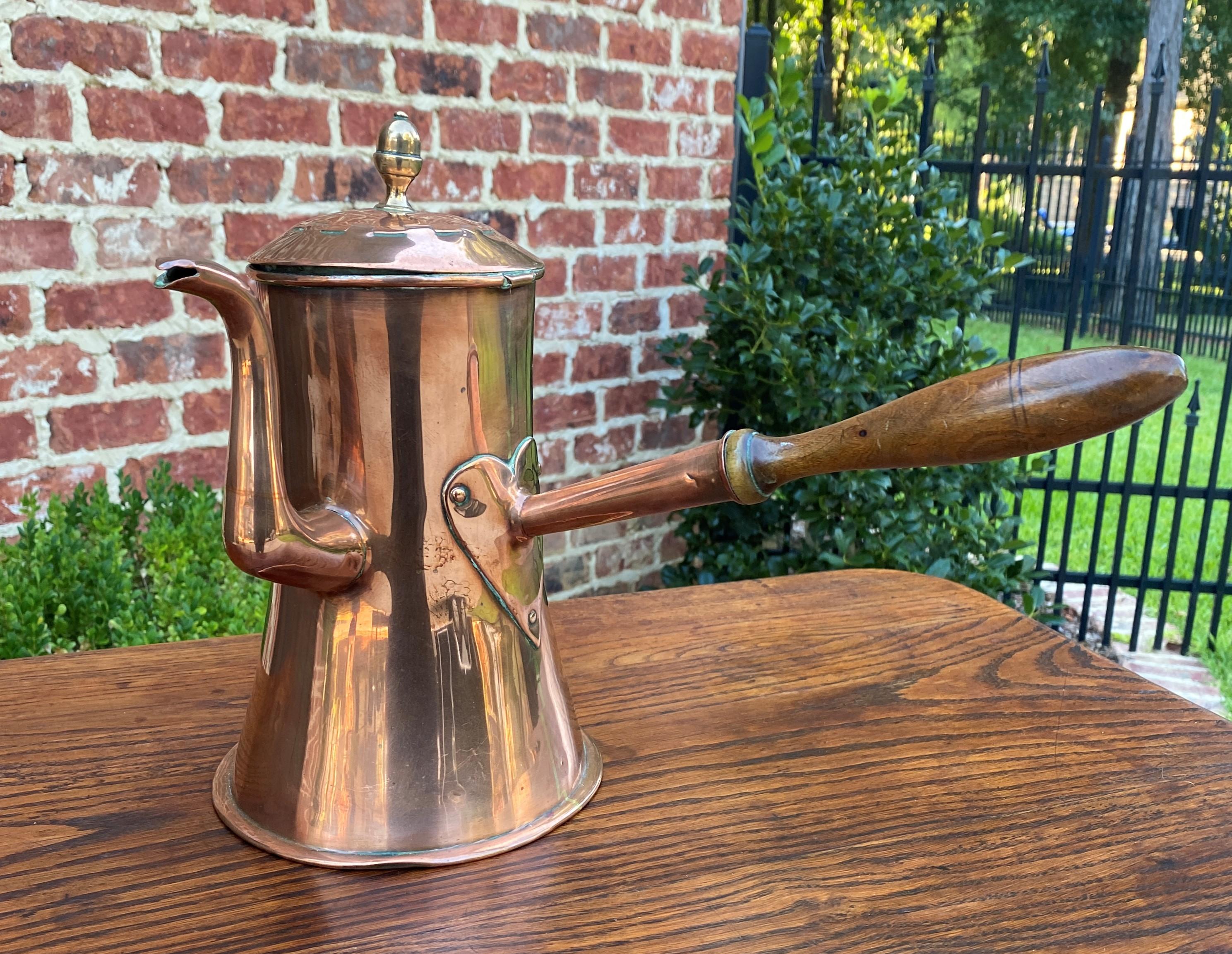 vintage copper tea kettle with wood handle