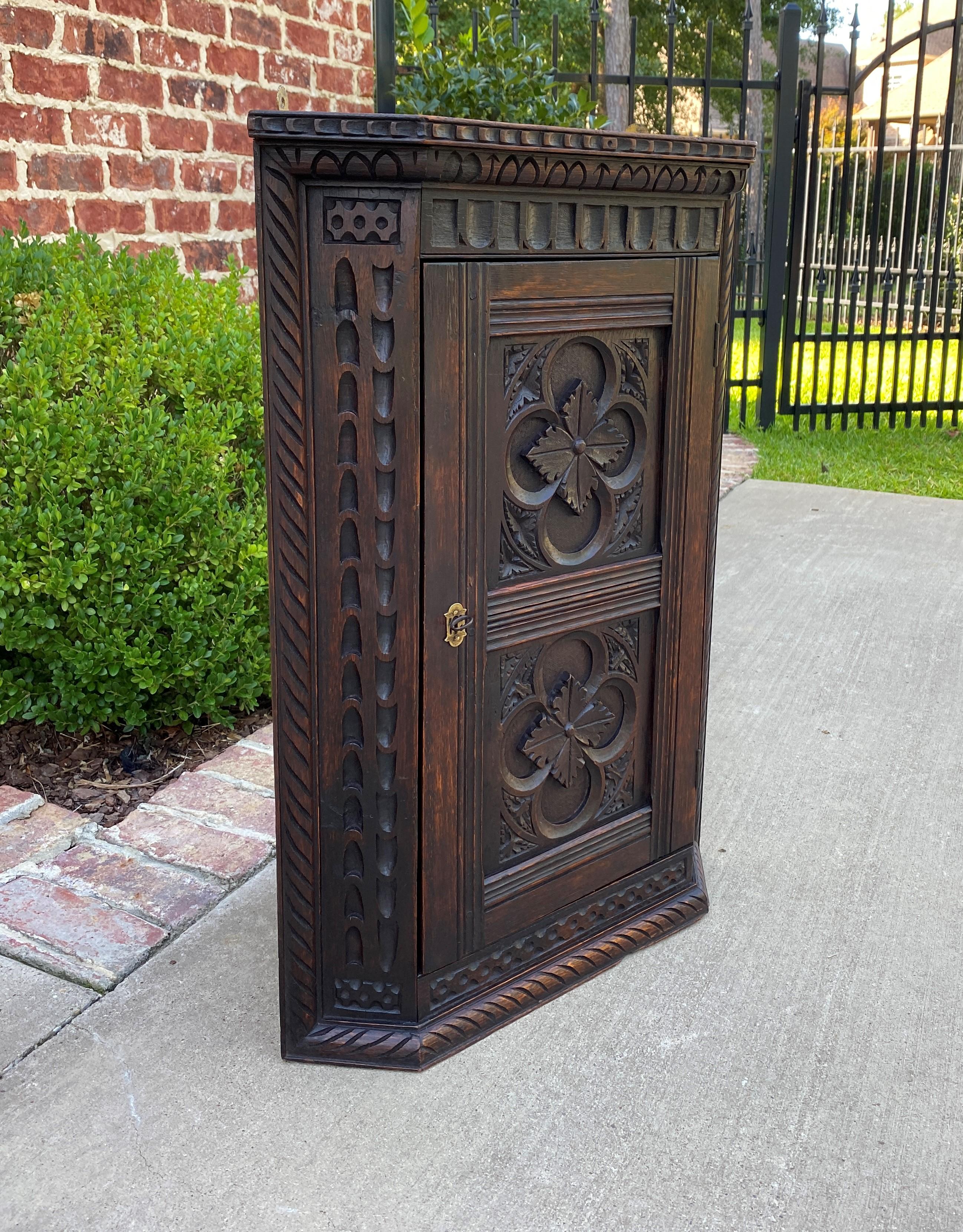 Beautiful highly carved antique english oak hanging wall or freestanding corner cabinet, medicine or spice cabinet with interior shelves~~Victorian era~~c. 1890s

Full of Classic English charm~~beautifully carved oak wall or freestanding