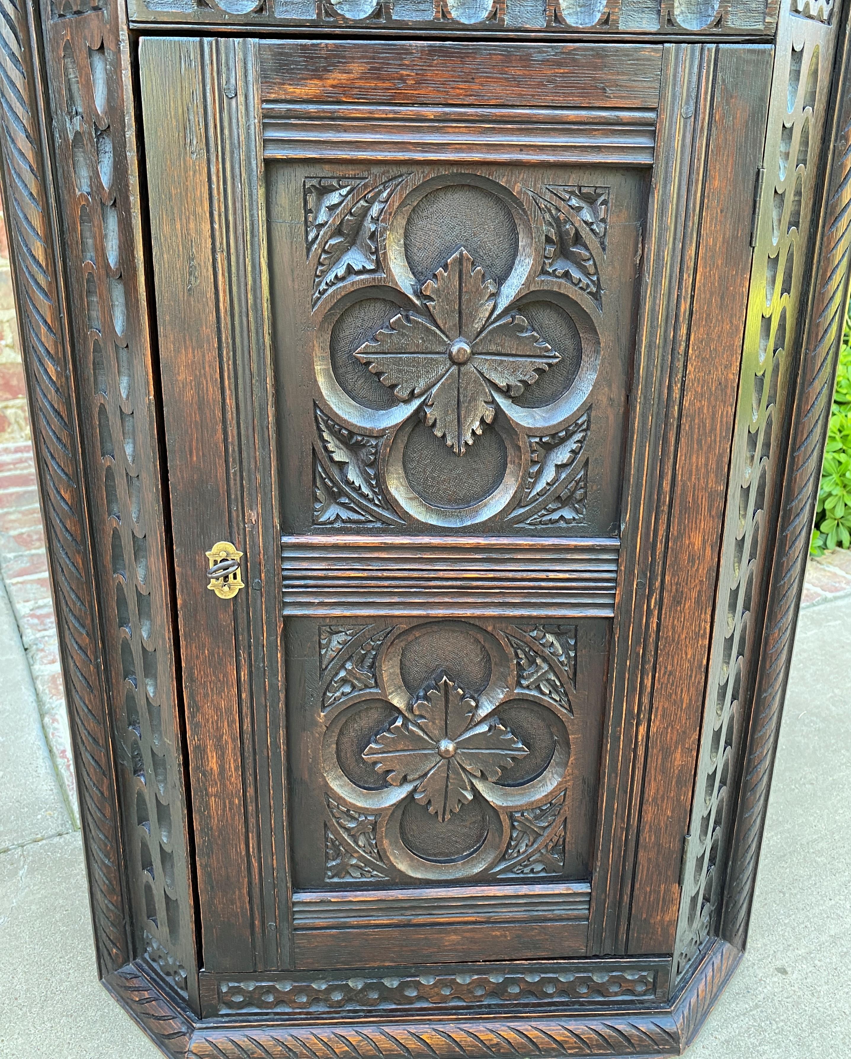 carved corner cabinet