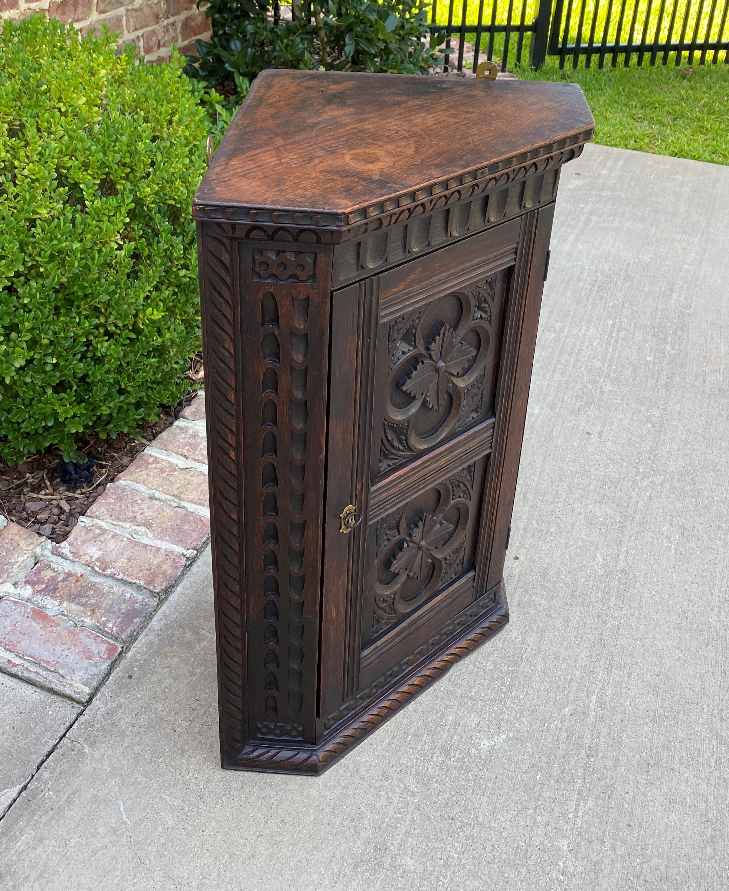 Antique English Corner Cabinet Carved Oak Hanging Wall Cabinet Large Storage 19C In Good Condition In Tyler, TX