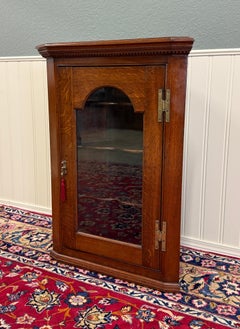 Antique English Corner Cabinet Carved Oak Hanging Wall Cabinet Storage c.1920s
