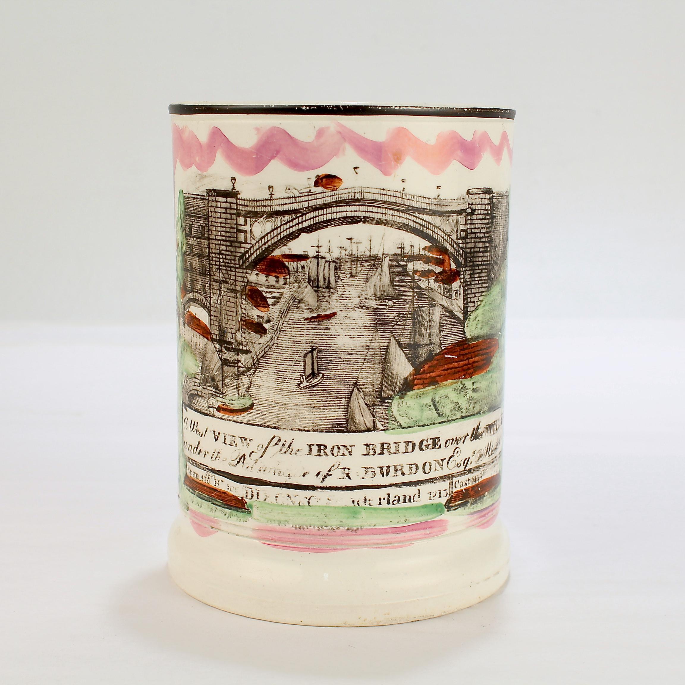 A fine antique English Sunderland Lustre creamware frog beer mug or cup.

With of transfer of the Iron Bridge from Shropshire, England, which fords the River Severn and was the first bridge in the world ever constructed of cast iron in 1781.