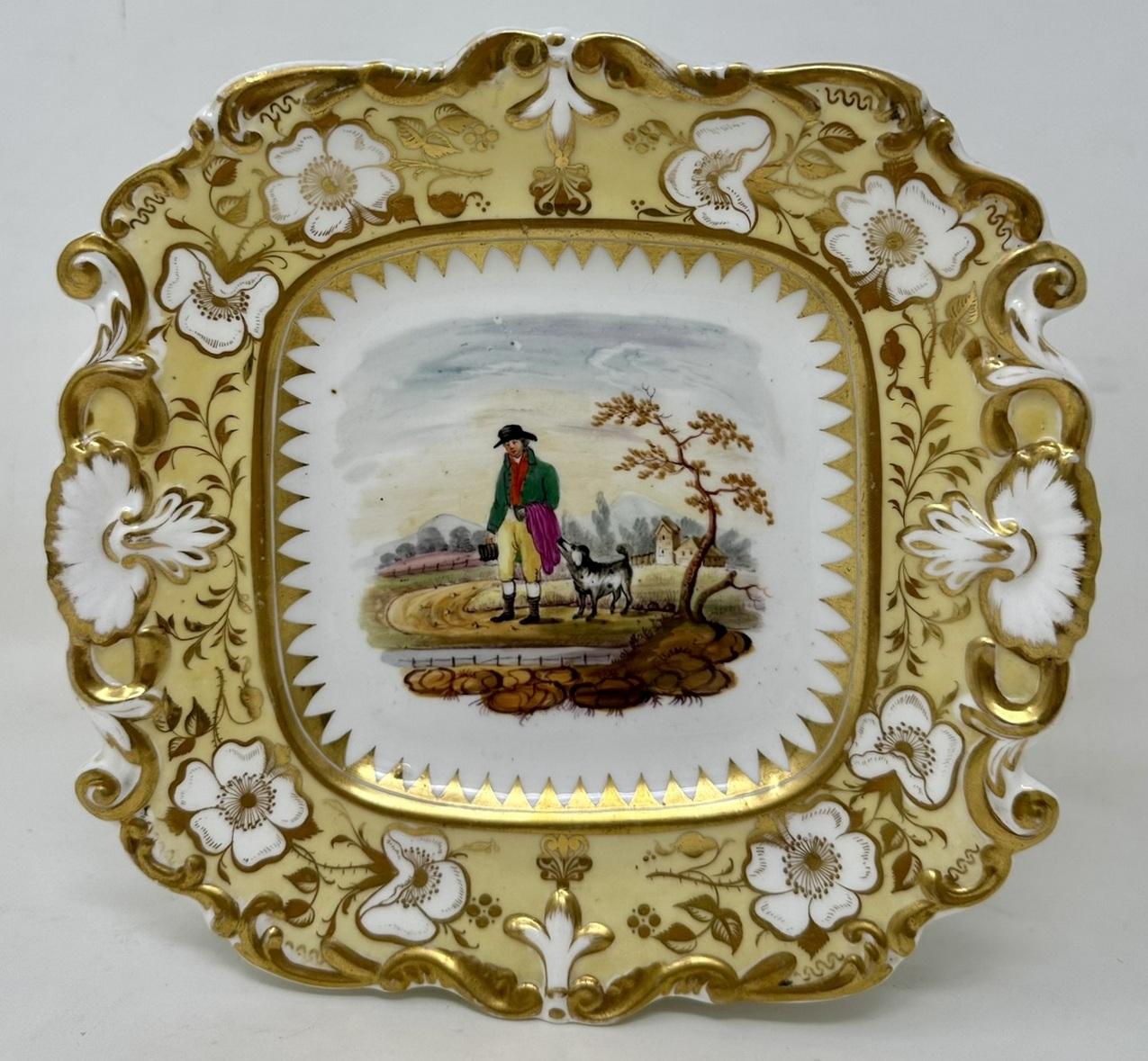 Wonderful Identical Pair of Early English Porcelain China Cabinet or Wall Plates of square outline with lavish raised gilt surrounds in the Rococo taste, possibly made by Royal Crown Derby or Rockingham. Mid to late Nineteenth Century. 

Depicting
