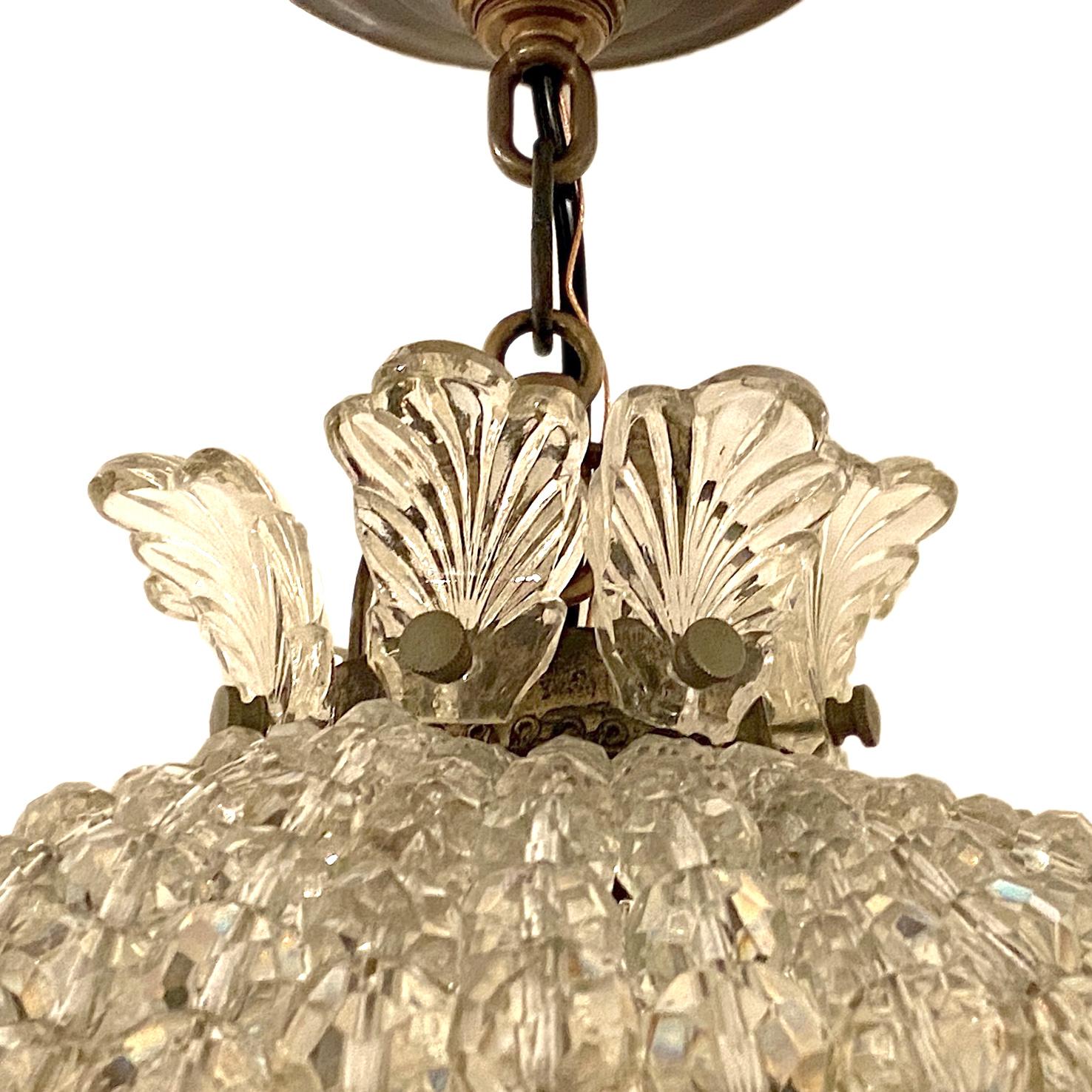 A circa 1900 English woven crystals lantern with three interior lights and original patina.

Measurements:
Drop: 21