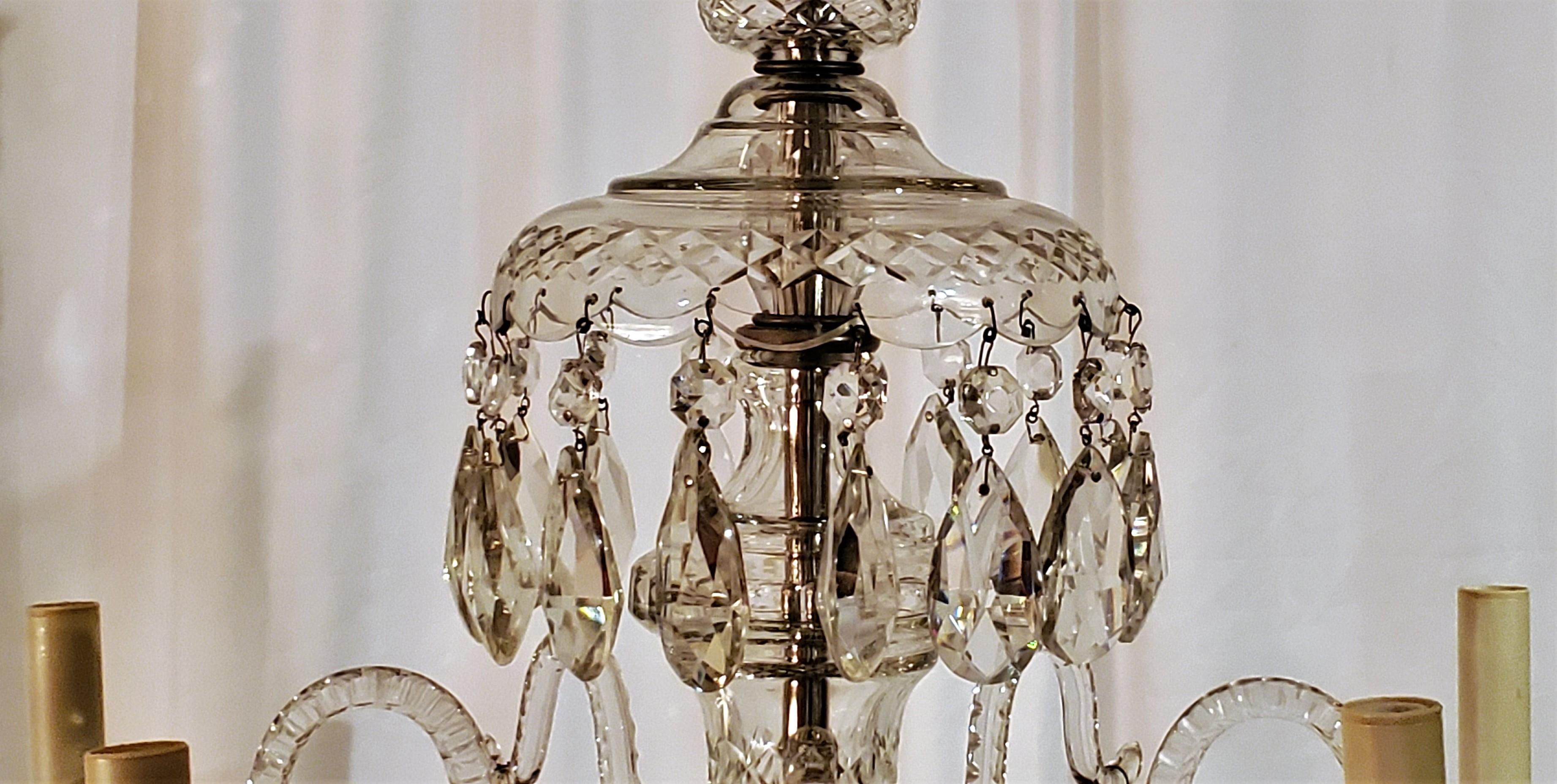This is a very pretty little chandelier with pleasing lines.