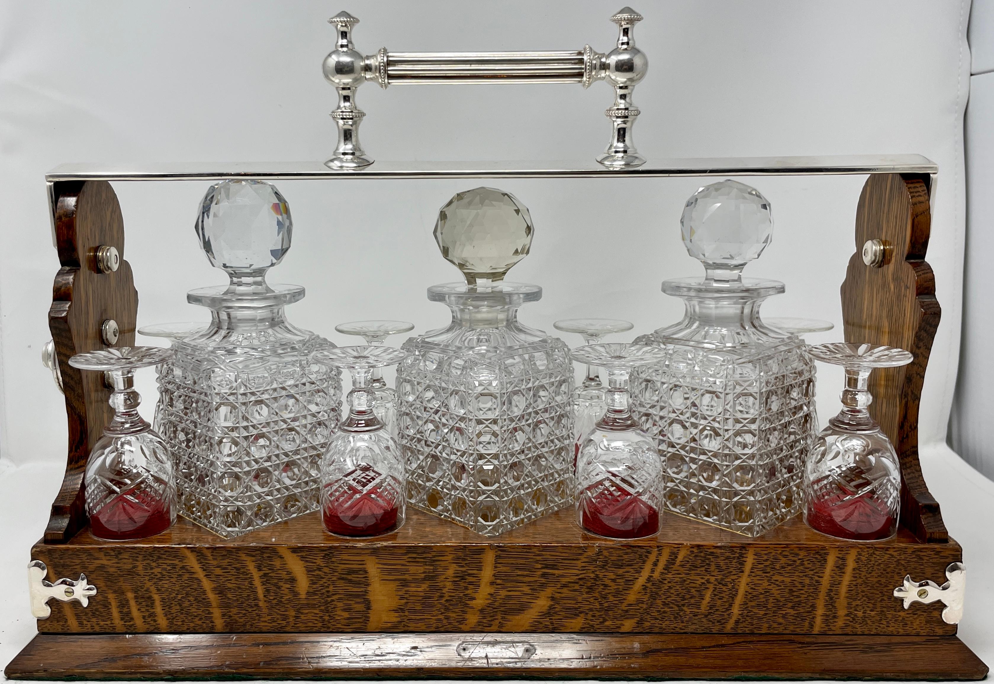 Antique English cut crystal tantalus, circa 1880. Made by Betjemanns & Sons in London.