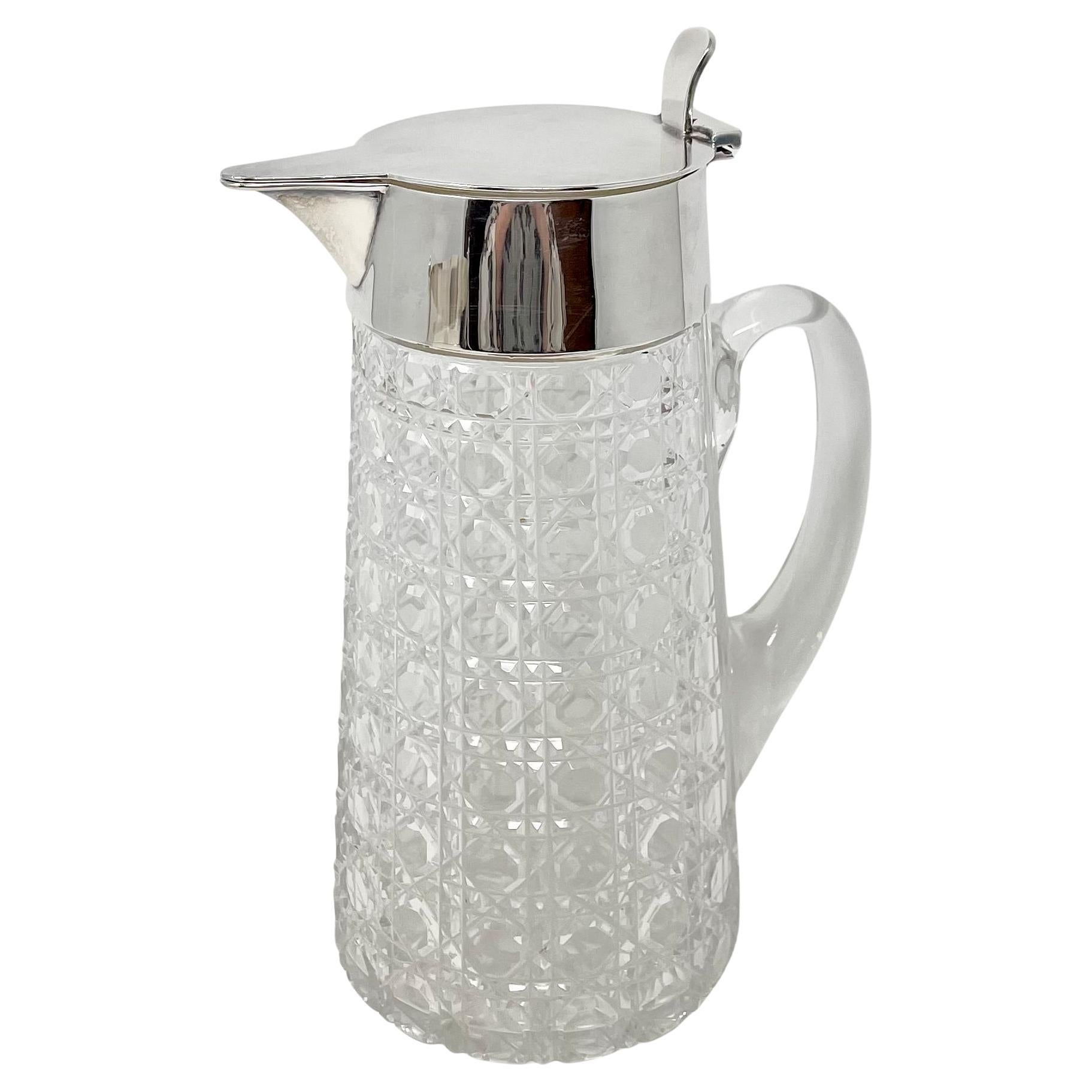 Antigua jarra de agua inglesa de cristal tallado y chapa de plata, circa 1900. Inglés en venta