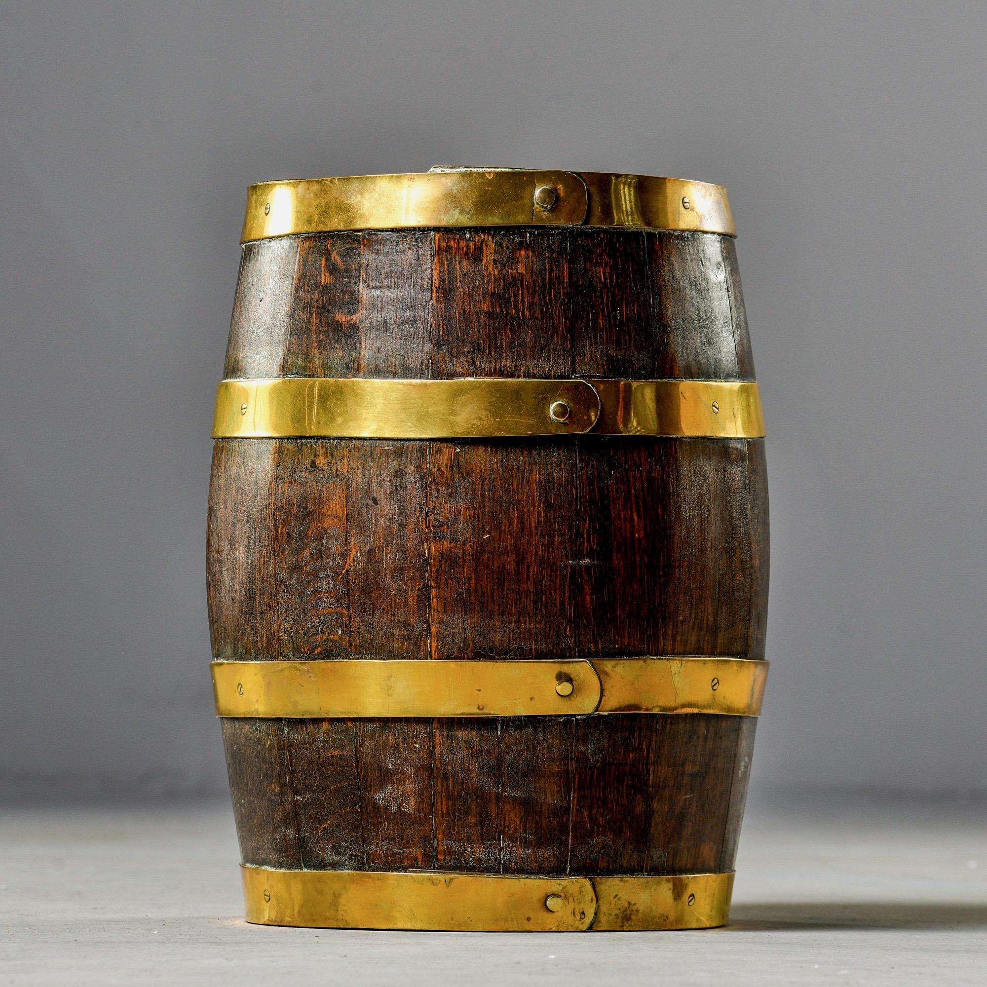 Rustic Antique English Dark Oak Barrel with Brass Bands For Sale