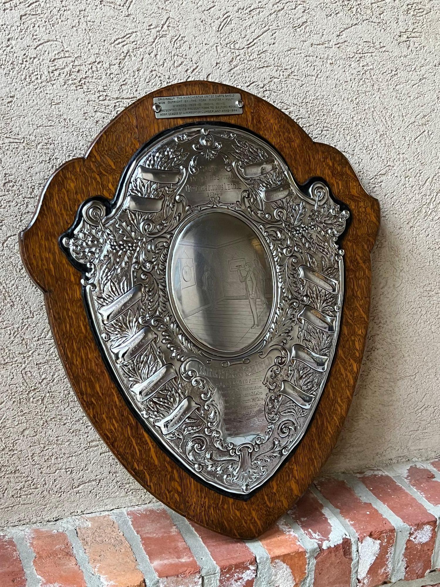 Antique English Dart Game Trophy Award Shield Oak Plaque Silver Plate c1909.
Direct from England, just arrived in our most recent container, we have several of these one-of-a-kind English trophies that are brimming with provenance, and oh “the