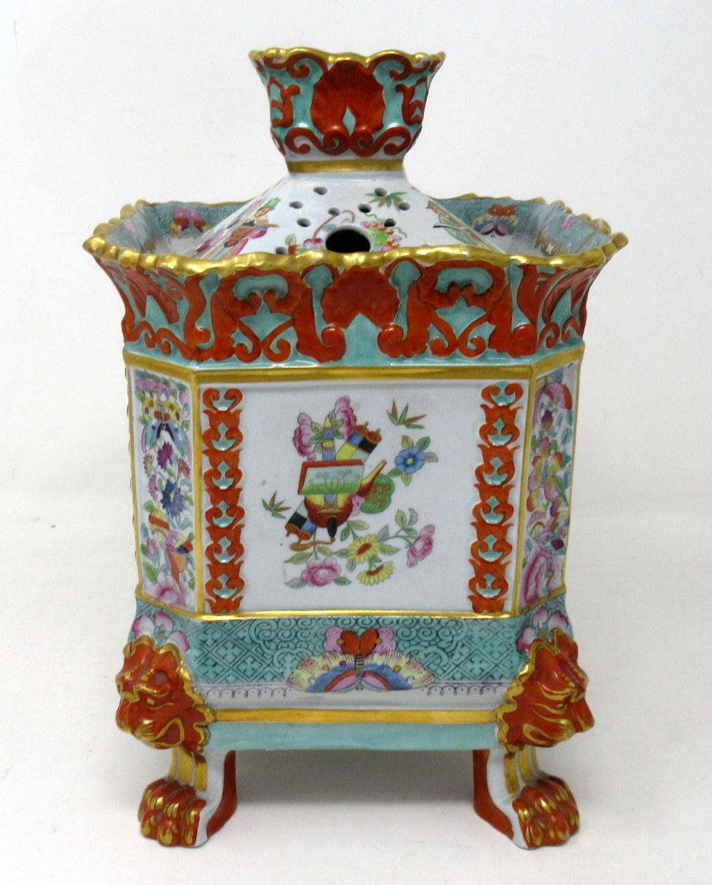 An exceptionally rare Davenport Bone China bulb pot or pot Pourri Centerpiece of museum quality, complete with its two original covers. Circa 1840. 

Each square panel richly hand painted in Chinoiserie style, each canted side panel with still life
