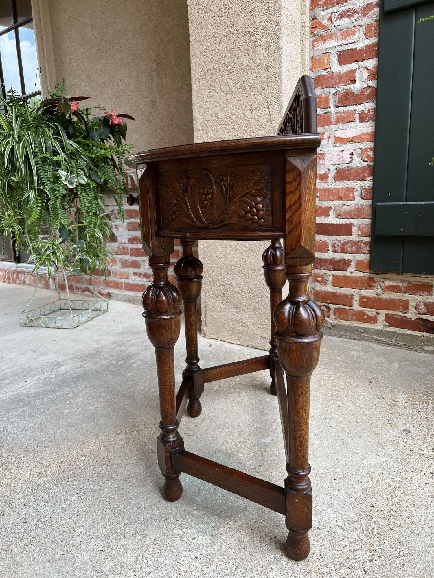 Antique English Demilune console table Carved Oak Petite Hall Table Jacobean style.

Direct from England, (YES, our English container finally arrived, and we have some amazing English antiques, and of course, lots of barley twist)!
 
This