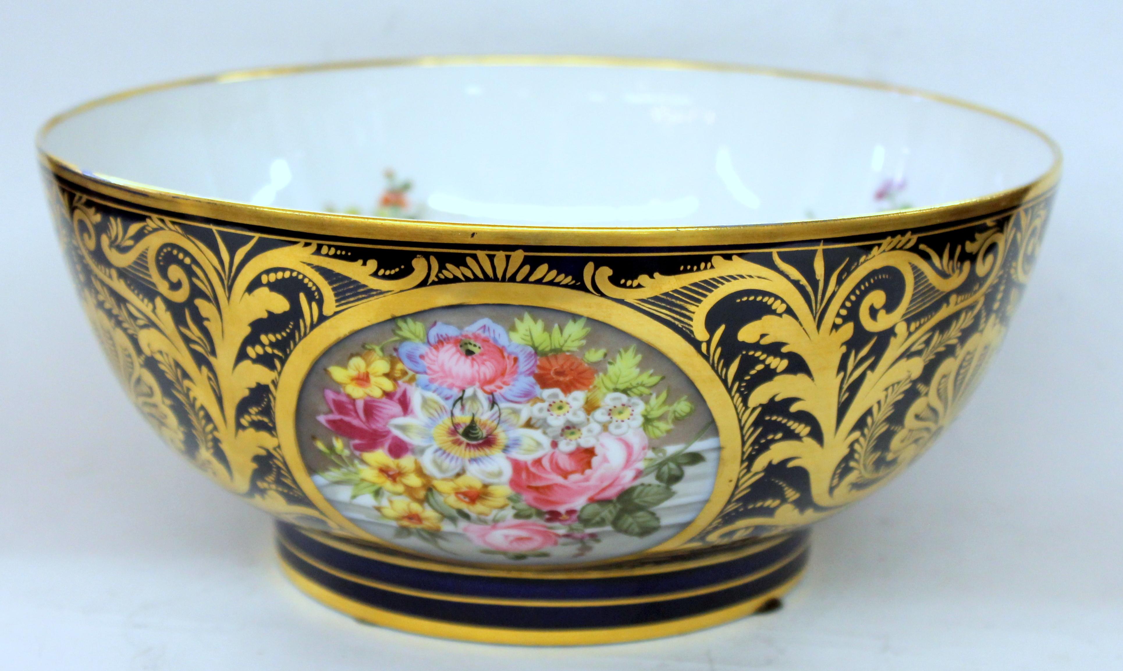 Exquisite quality antique English Derby Porcelain hand painted floral motif and richly gilt cobalt large round bowl

Red painted 