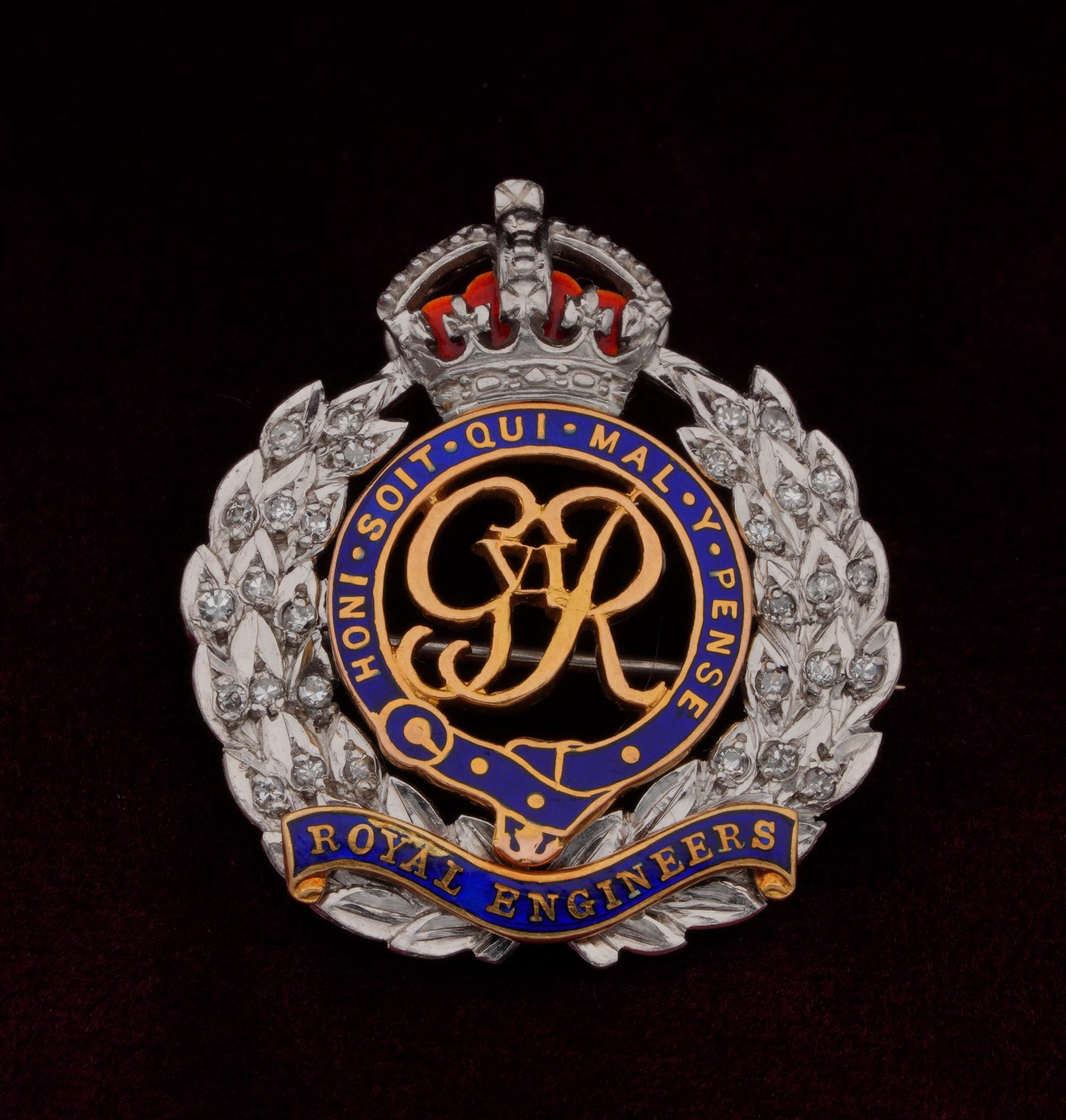 Royal Engineers

Collectable, antique 1930s ca - English 
Finely made of Platinum 18 KT gold detailed with Red and Blue enamelling
Embellished with Diamonds approx .30 Ct
Bearing “Honi -Soit -Qui -Mal – Y – Pense – Royal Engineers” motto
Measures :