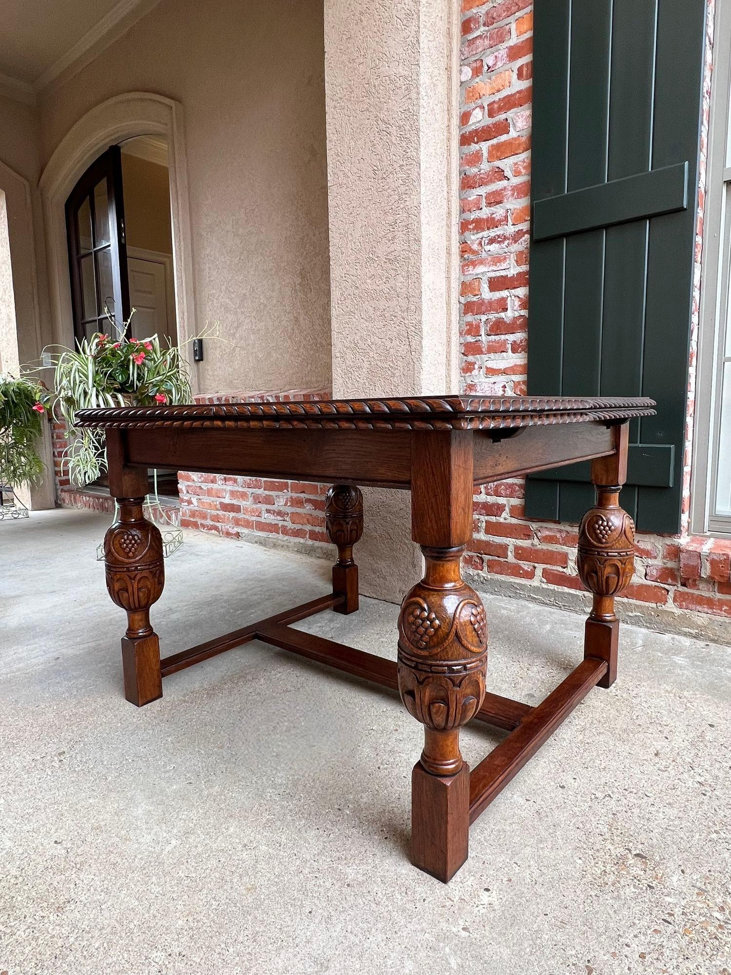 Antique English Dining Table Draw Leaf Tudor Carved Tiger Oak Large Size Game or Kitchen Table.

 Direct from England, a beautiful antique draw leaf table that expands to almost 6 ft. with leaves extended! The large, paneled tabletop features