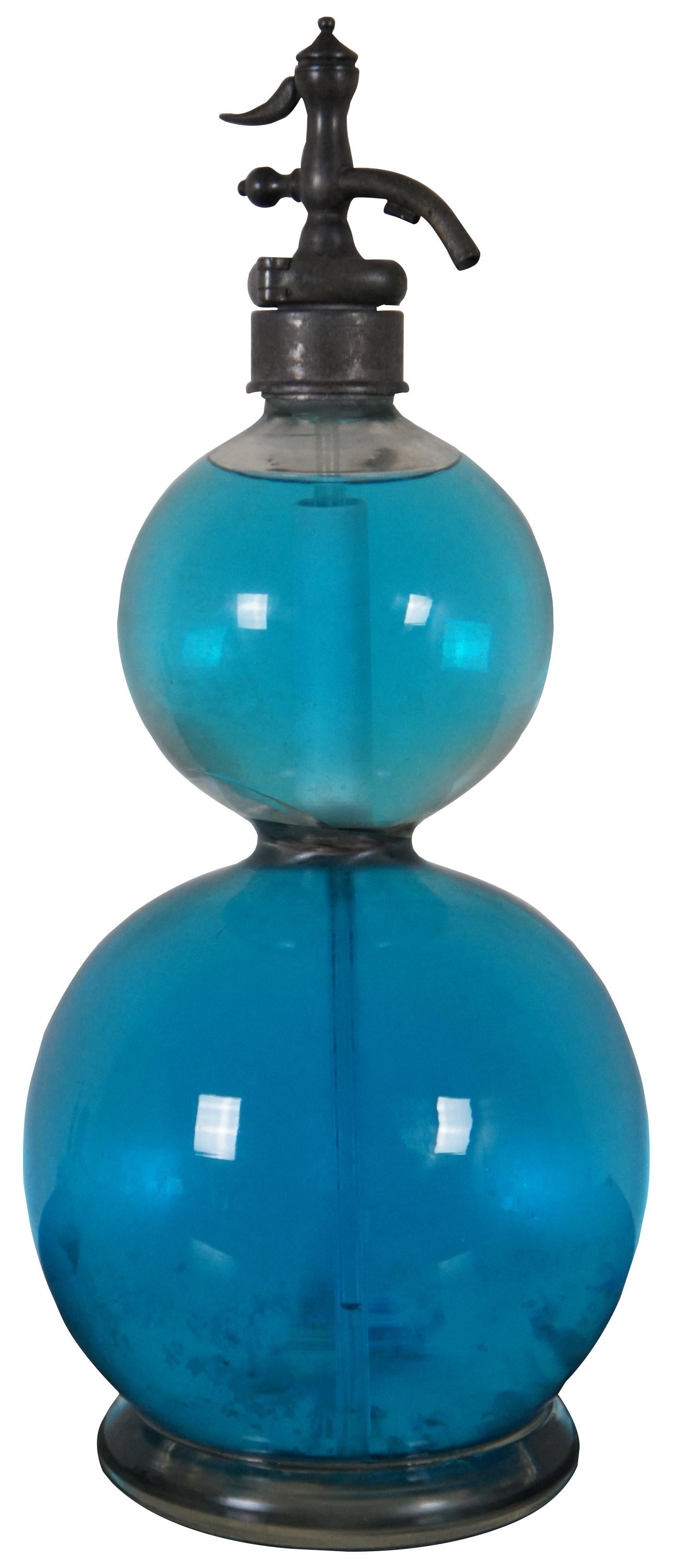 Rare antique standard English Seltzogene by the British Syphon Manufacturing Company; filled with blue tinted water by a previous owner. This bottle is likely to date to the late 1800's and sports an art nouveau, double globe/gourd design. The gourd