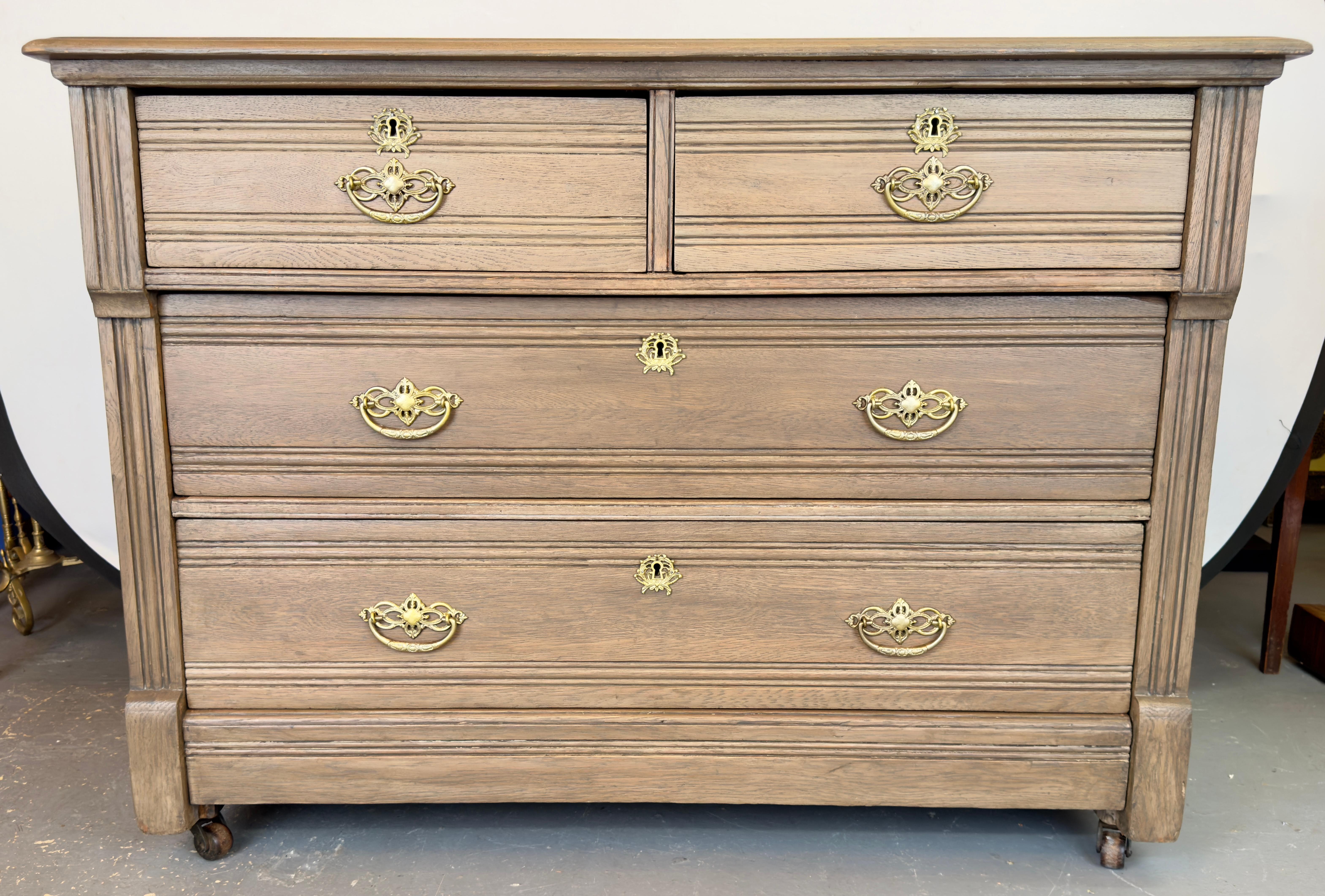 Victorian Antique English Eastlake Oak Four-Drawer Commode or Dresser