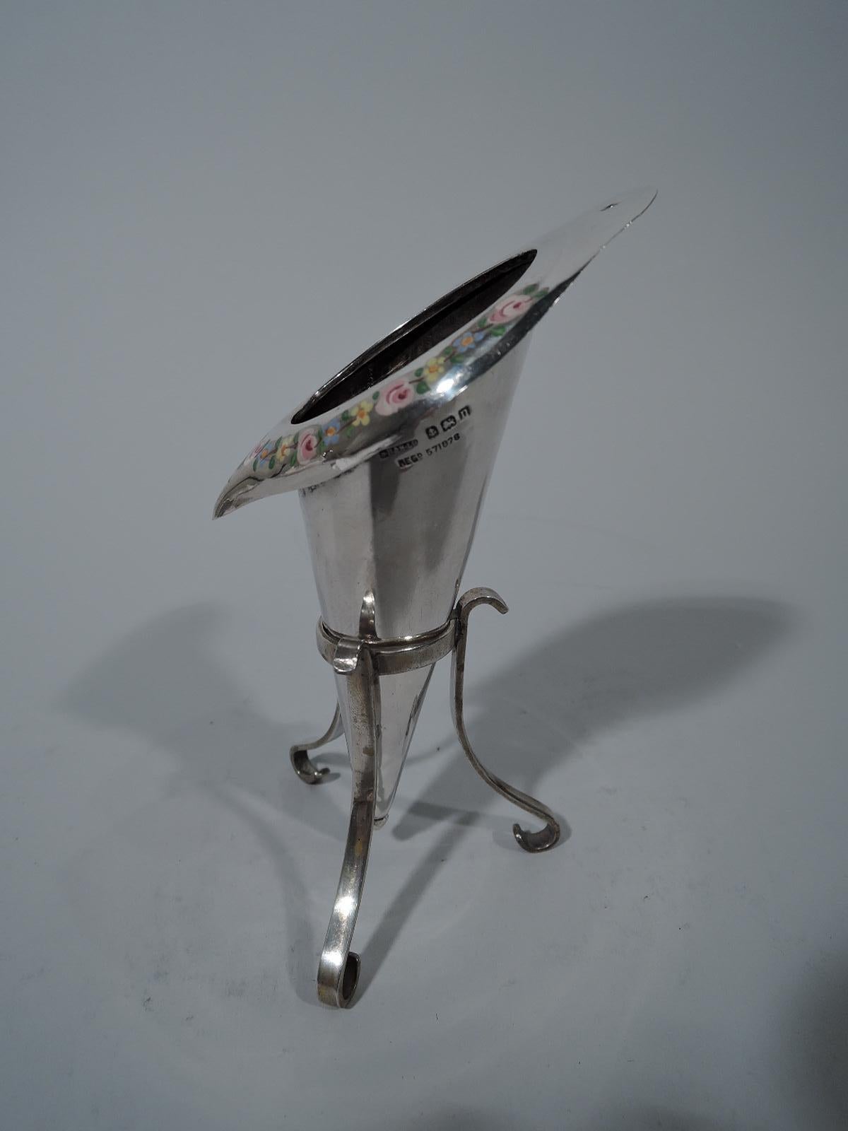 George V sterling silver posy holder. Made by S. Blanckensee & Sons in Birmingham in 1912. Conical with ball terminal. Mouth asymmetrical rim turned-down with enameled floral garland. Rests in tripod Stand with 3 scrolled supports mounted to ring.