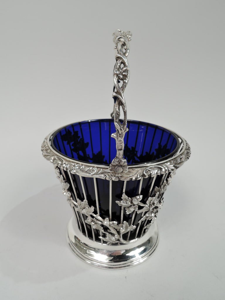 Edwardian Georgian sterling silver cream pail. Made by Barnard & Sons, Ltd in London in 1903. Open wire sides applied with oak branches and asymmetrical cartouche engraved with armorial and Latin motto Spes Melioris Vitae (Hope of a Better Life).