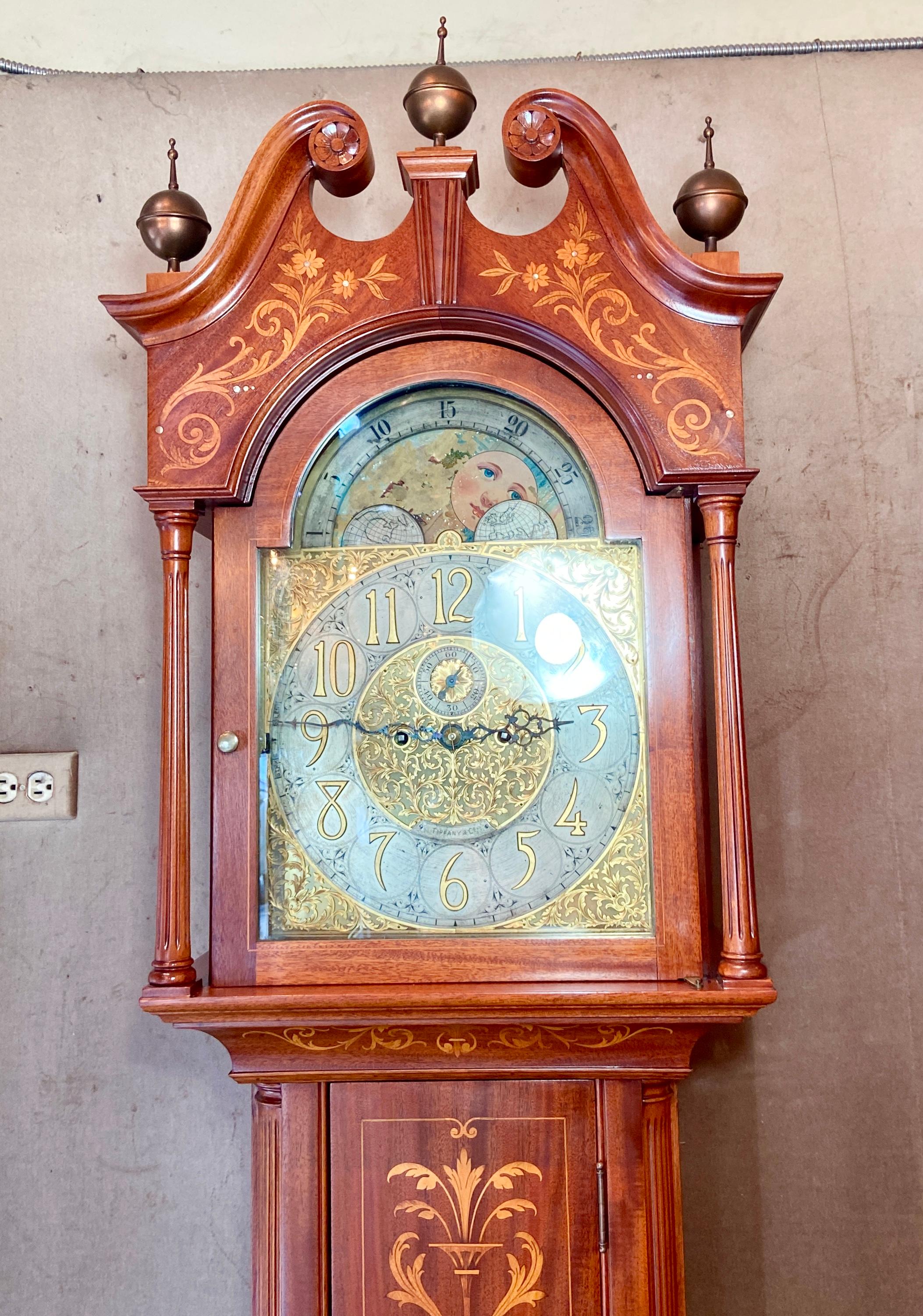 Antique English Edwardian mahogany with satinwood inlay grandfather clock retailed for Tiffany & Co., Circa 1900-1910.