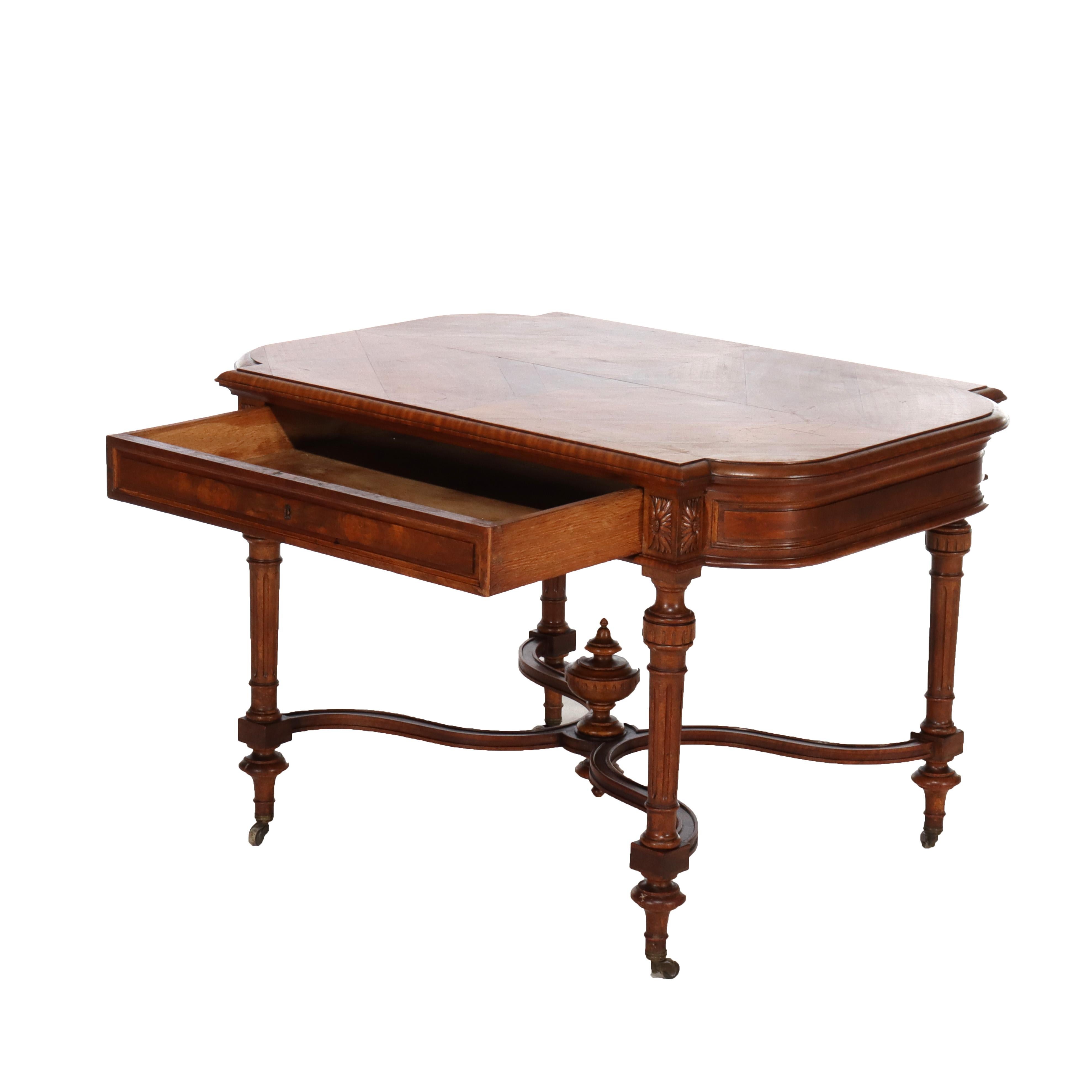 ***Reduced In-House Delivery Rates - Click on “Ask Seller” to Request a Quote***
Antique English Edwardian Style Carved Walnut & Burl Library Table with Casters C1910.   
Measures - 29.75