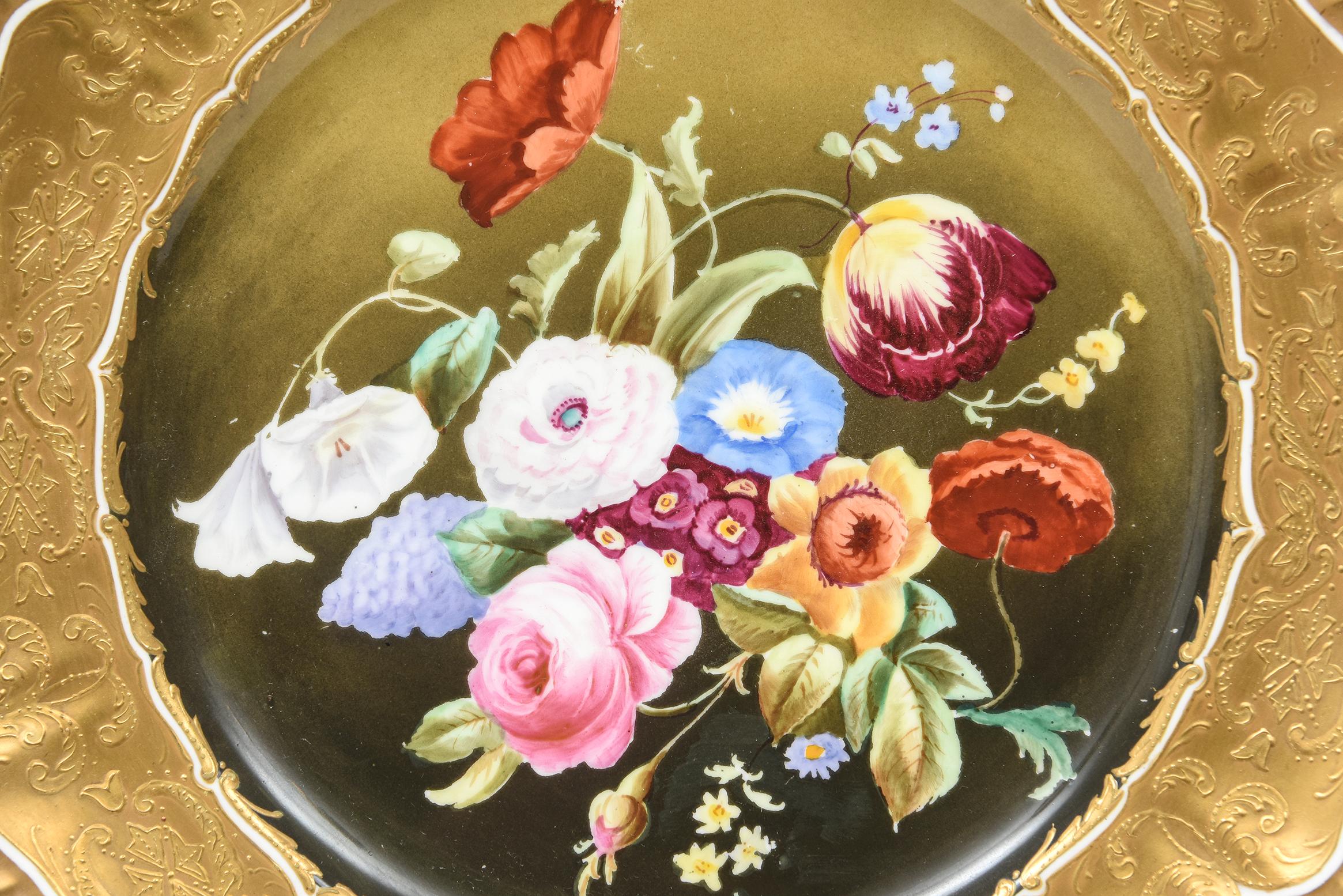 A visually stunning porcelain plate by one of England's premier Gilded Age factories: Hammersley & Co and custom ordered through Chicago's fine retailer Burley & Company. This wall or cabinet piece was finely crafted with a shaped gadrooned edge and