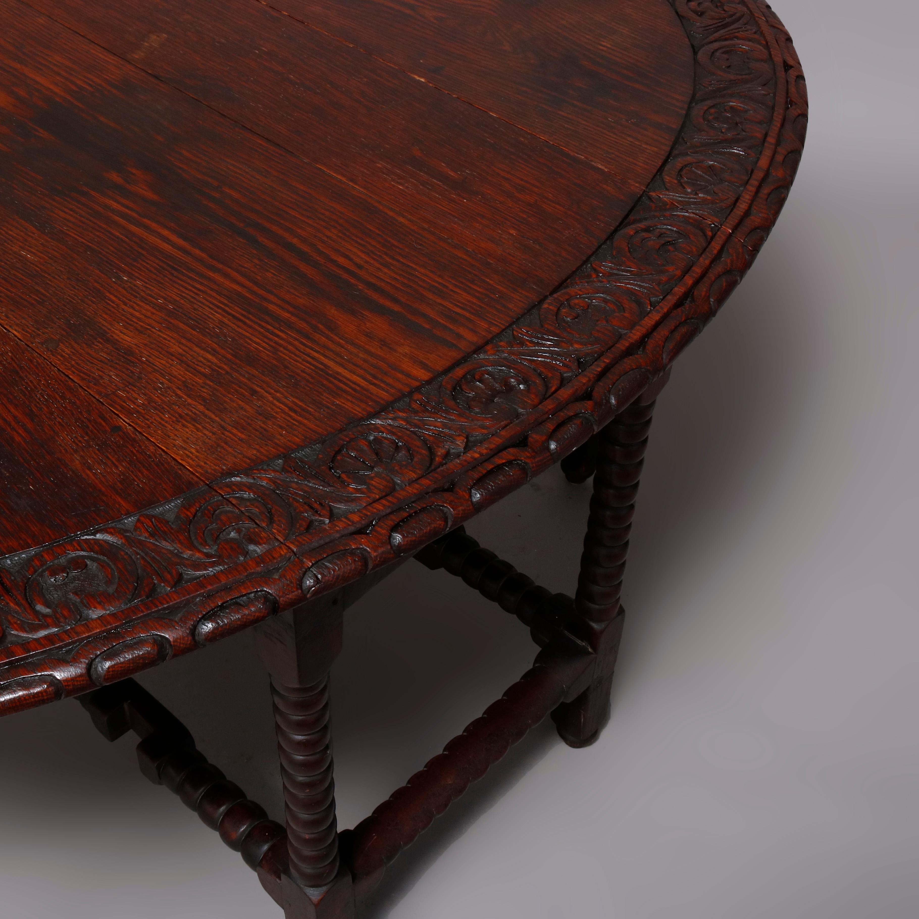 19th Century Antique English Elizabethan Carved Oak Drop Leaf Dining Table, circa 1860