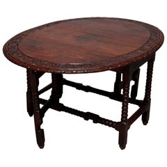 Antique table de salle à manger élisabéthaine anglaise en chêne sculpté à abattant:: vers 1860