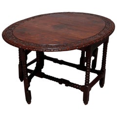 Antique English Elizabethan Carved Oak Drop Leaf Dining Table, circa 1860