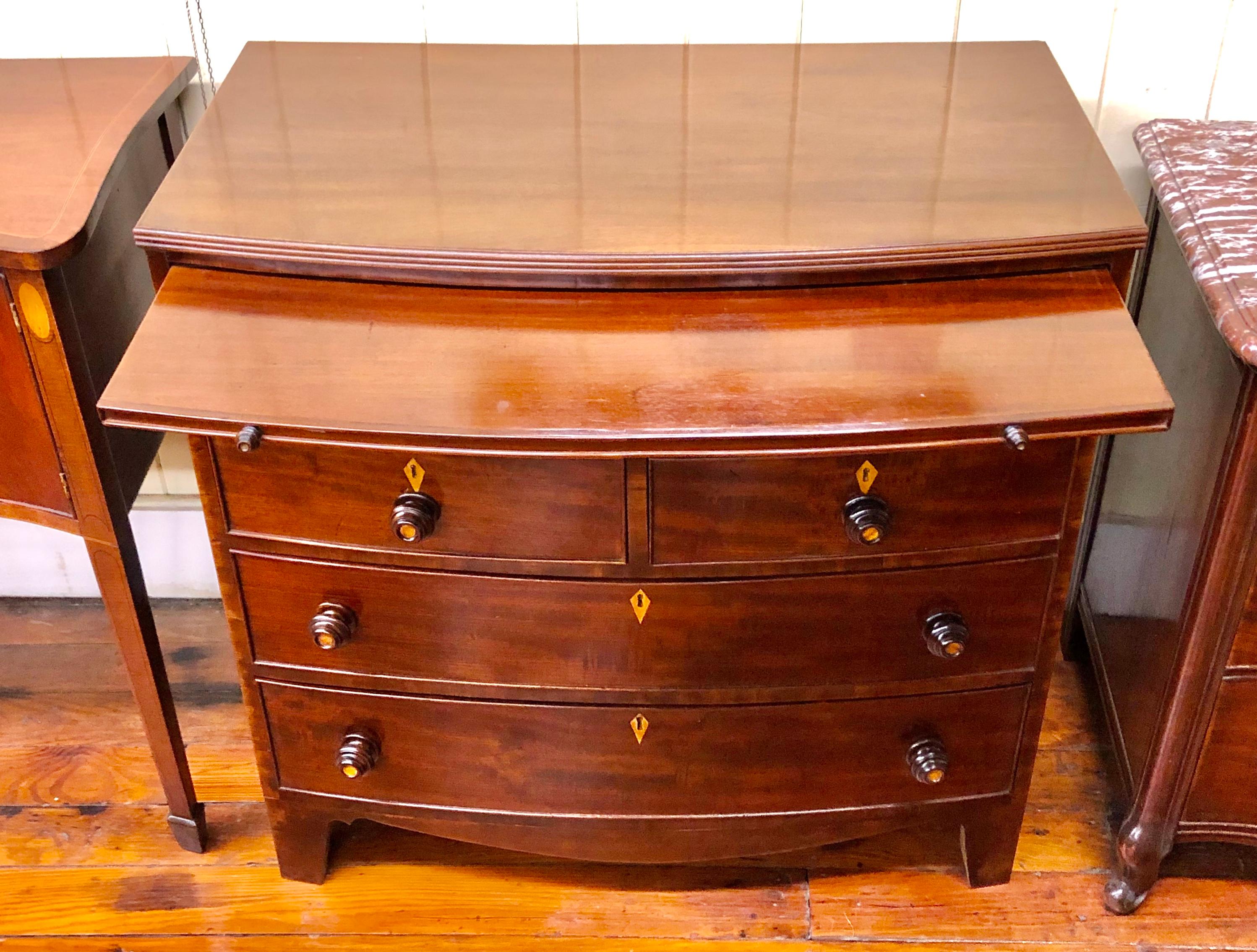 George IV Antique English Figured Mahogany Bowfront Chest with Brushing Slide